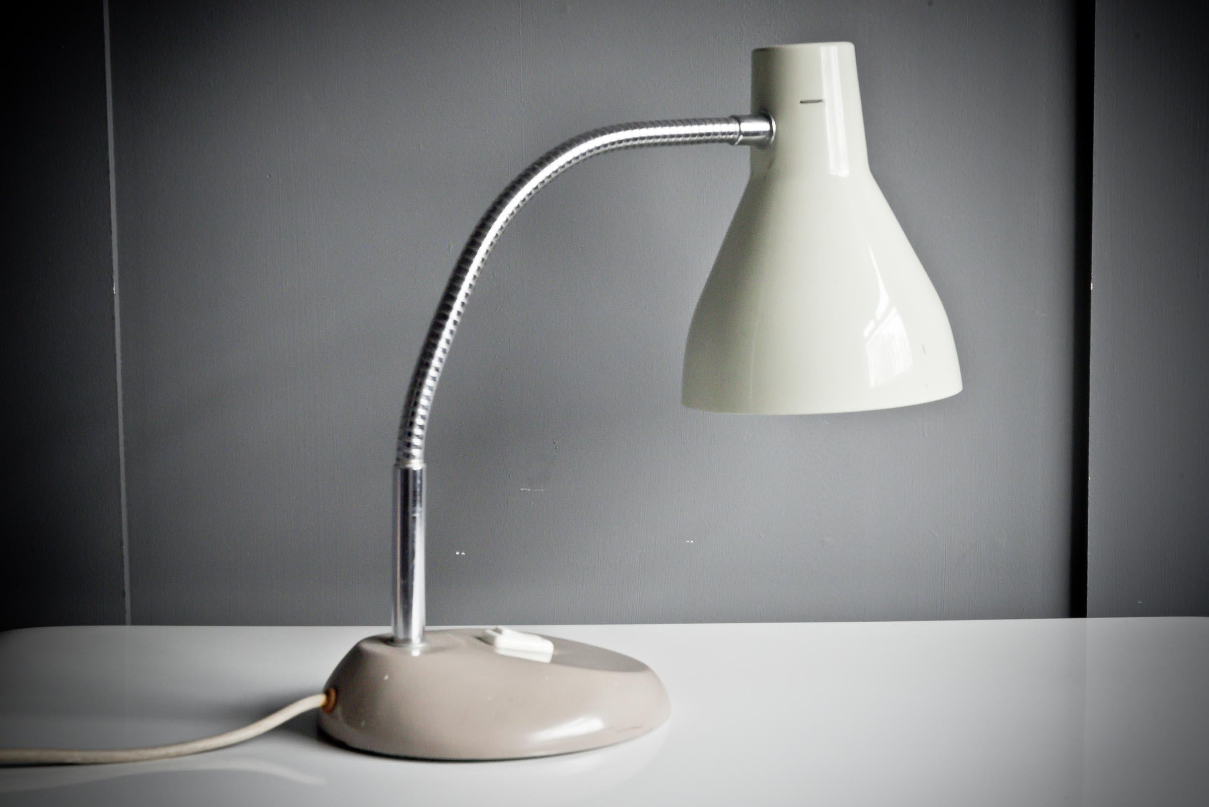 1970s desk lamp with articulated arm designed by Herbert Terry in an earthy tones of stone,grey and chrome.