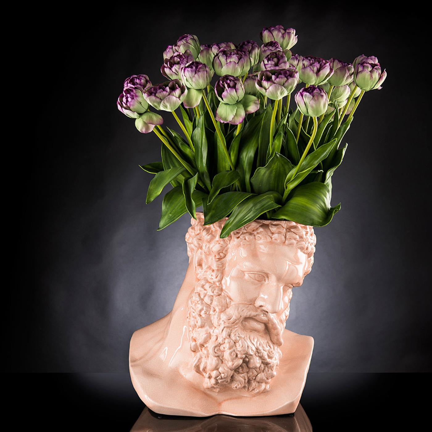 Classical Italian art meets modern styling and artisanal flair with the Hercules Cantaloupe Vase. Depicting the famous hero from ancient Greek mythology, this decorative piece is beautifully crafted from ceramic with a stunning orange finish.