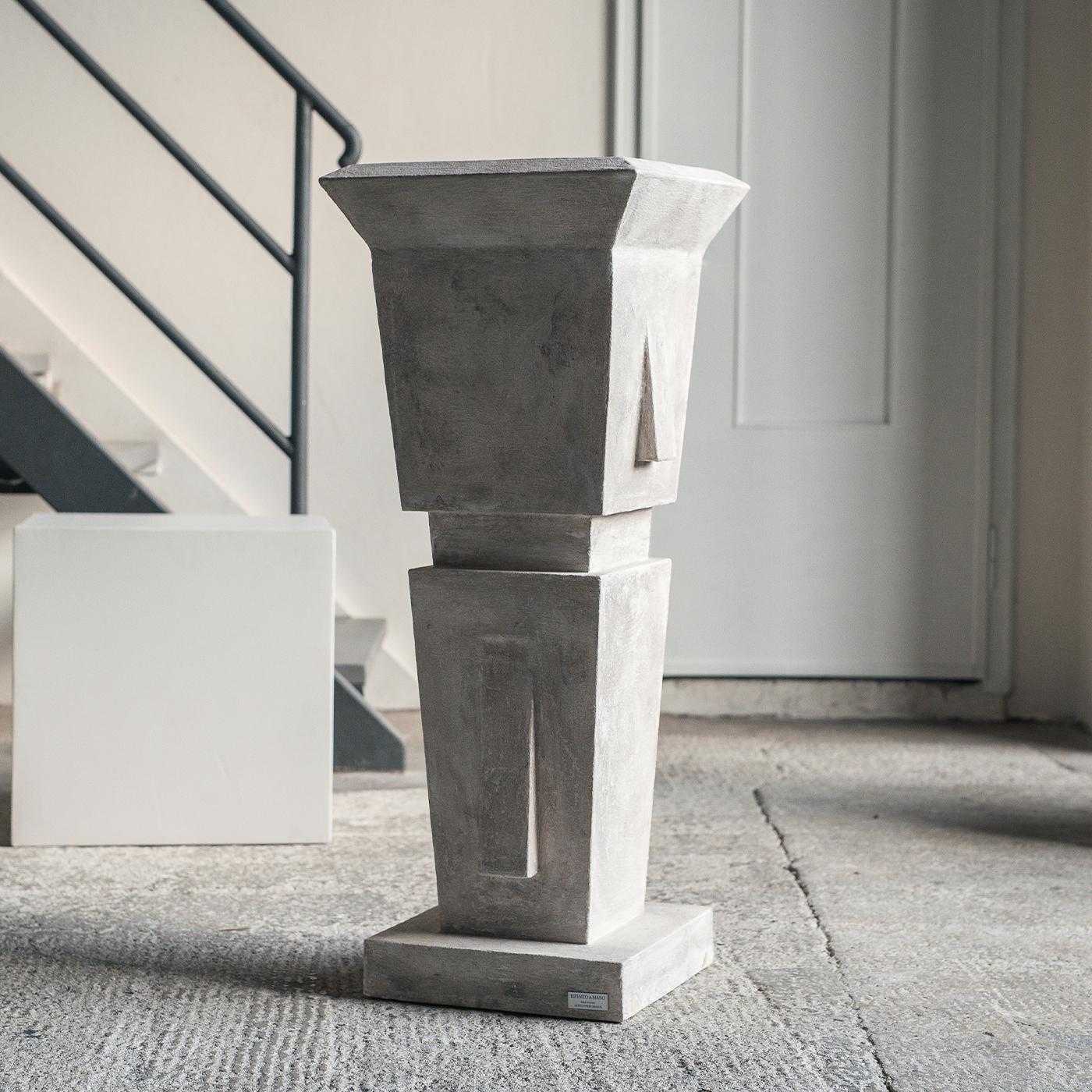 An exquisite decor piece of classic sophistication, this sculpture will complement both contemporary and traditional interiors alike. Handmade of high-density polystyrene with a base in cement, it is finished in a plaster-effect of an antiquated