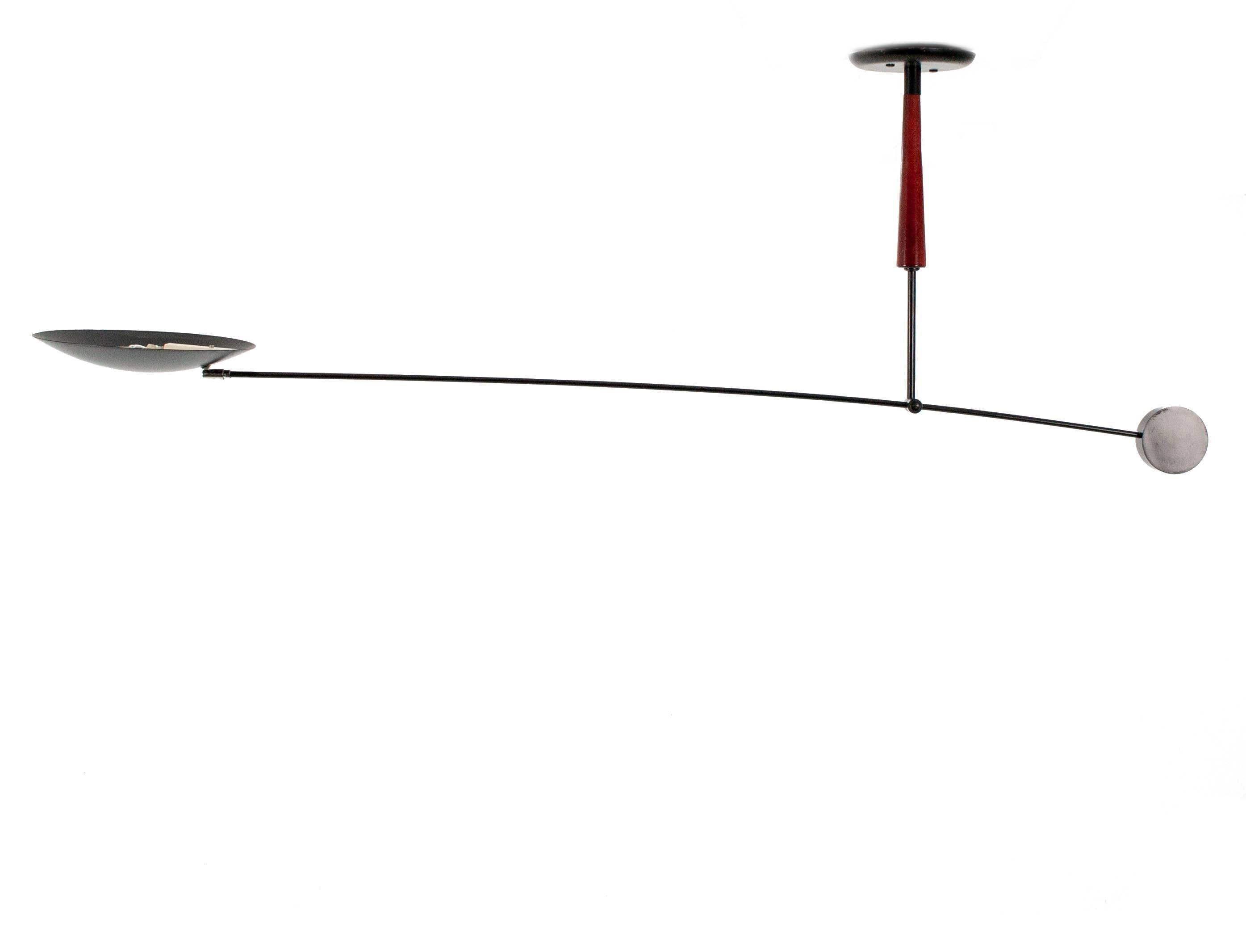 Very large counterbalanced ceiling mounted swingarm halogen lamp and flagship of Dutch lighting specialists Herda's 1980s 'Balance' series of swingarm lamps. With a span of nearly 1.50 meters and three points of articulation this highly impressive