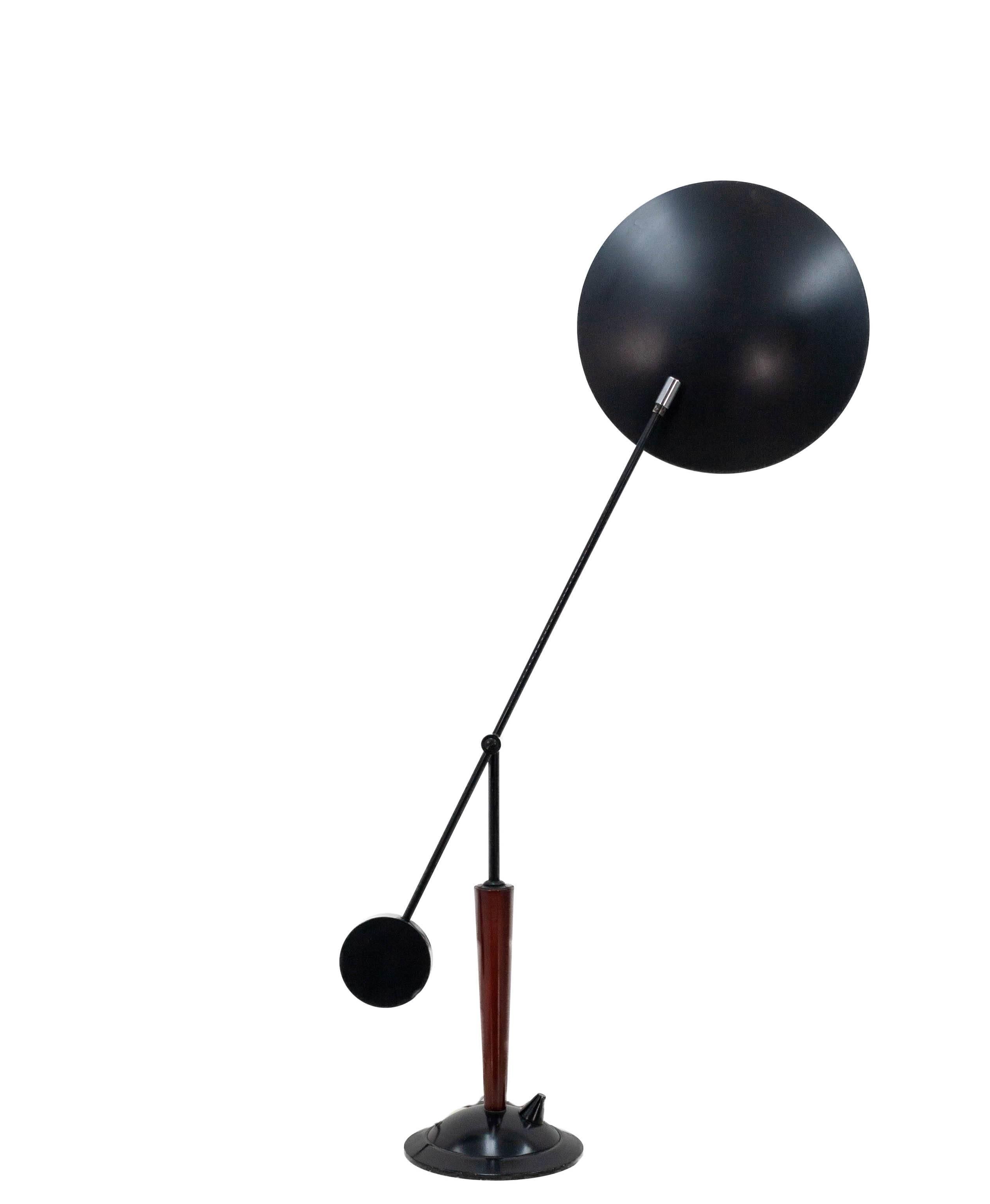 The smallest member of the Herda 'Balance' line, this striking table lamp features the same highly adjustable counterbalanced swing-arm design as its larger siblings in a table-sized format. The dimmer is integrated into the base and controlled by a