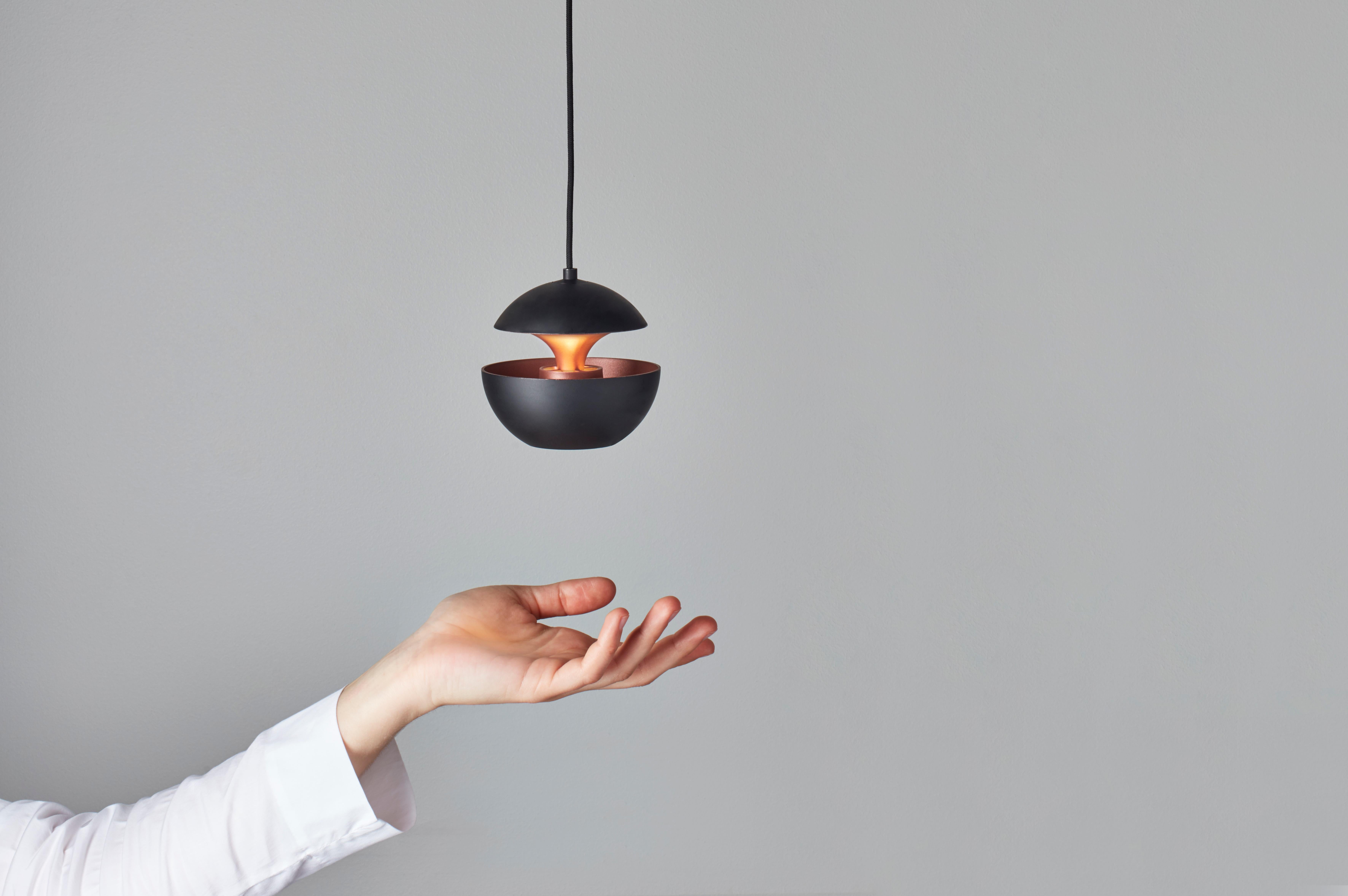 Here comes the sun mini black pendant lamp by Bertrand Balas
Dimensions: D 10 x H 10cm
Materials: Aluminum
Available in different sizes and colors

All our lamps can be wired according to each country. If sold to the USA it will be wired for
