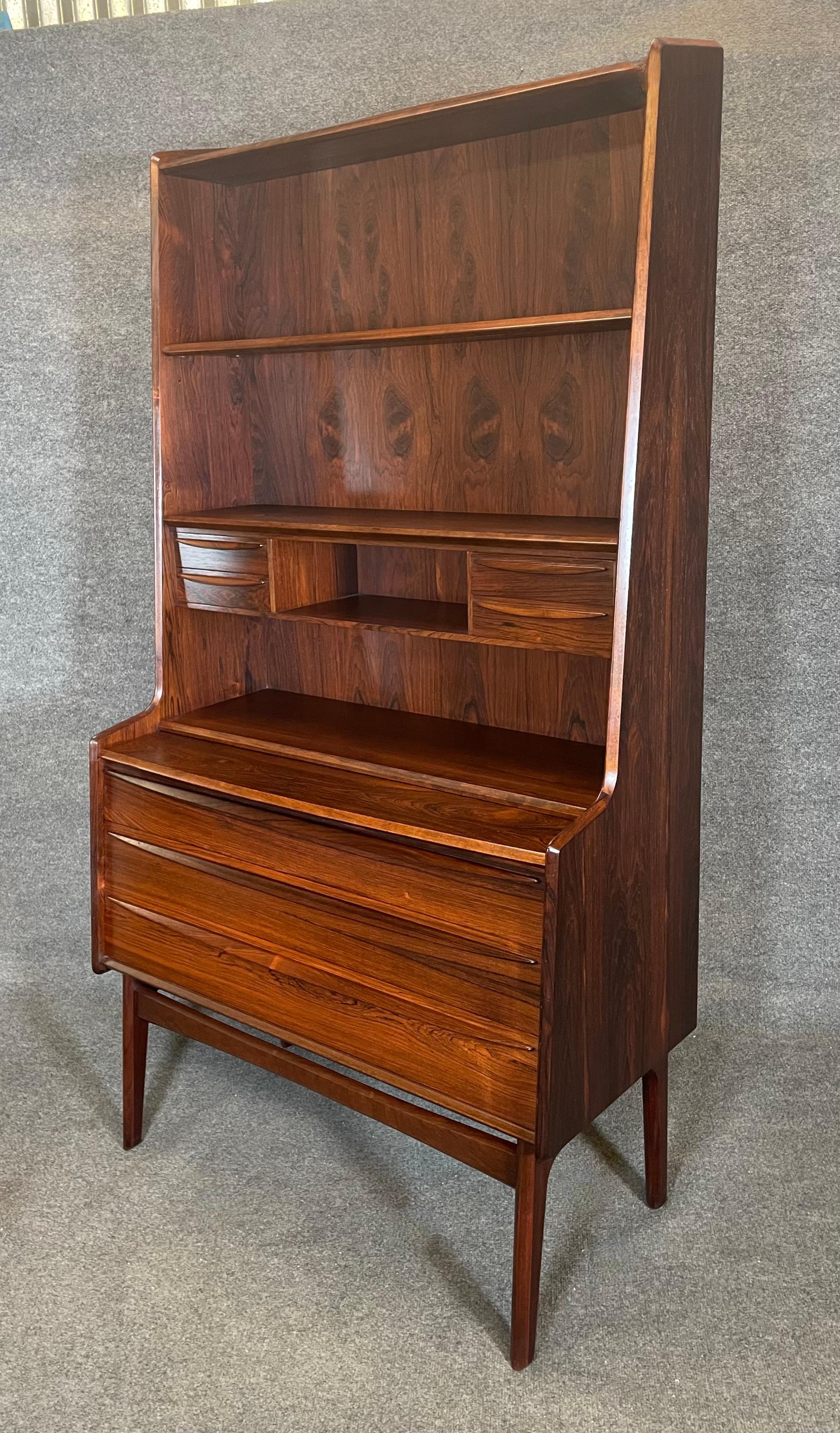 Rosewood Here is a beautiful Scandinavian modern secretary-desk-bookcase manufactured in  For Sale