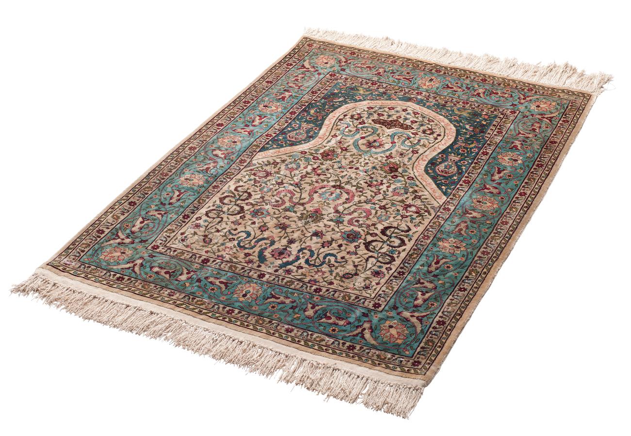 Hereke carpet, a silk prayer mat from Turkey. Hereke carpets were produced in Hereke, a coastal town in Turkey, 60 km from Istanbul.