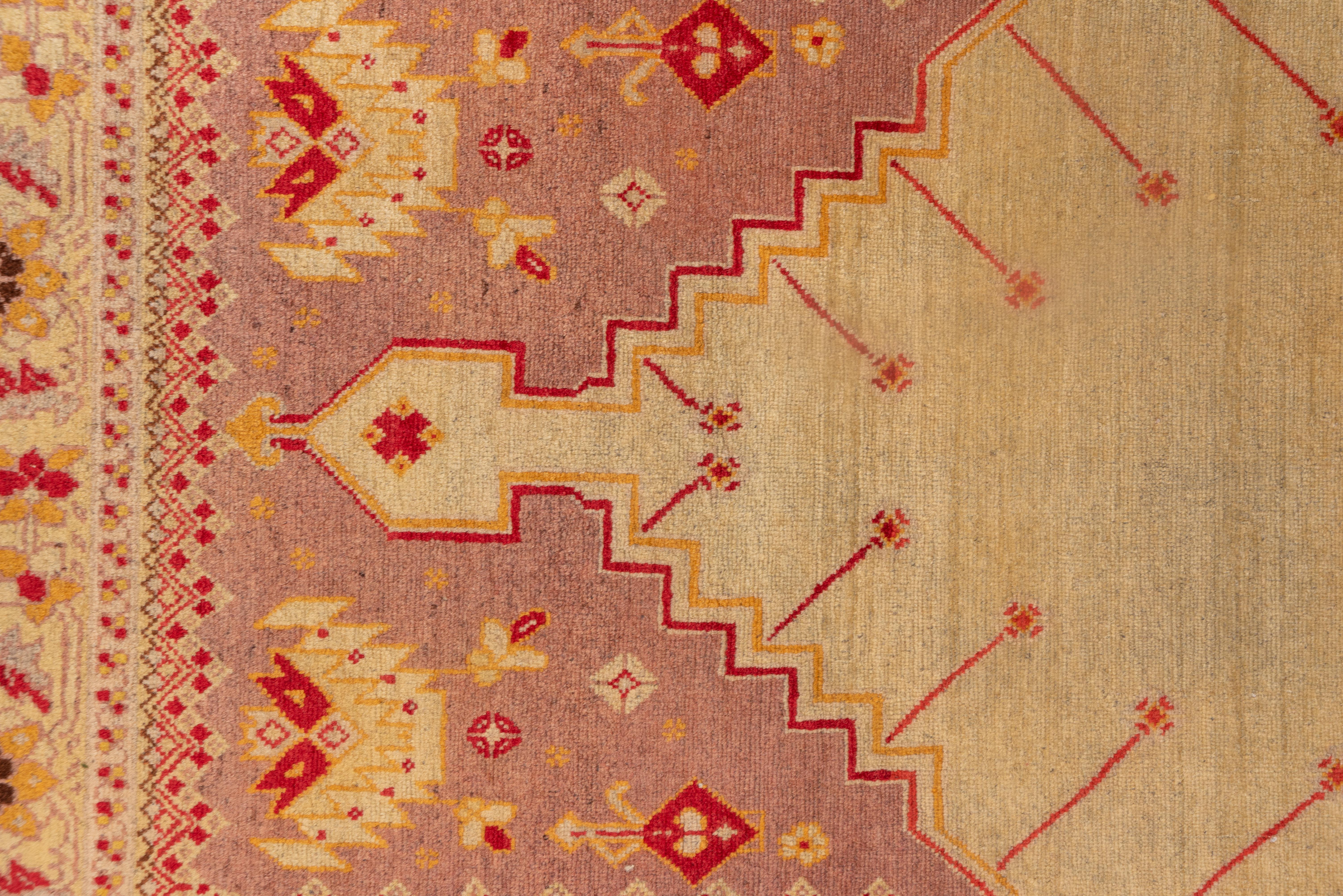 Early 20th Century Hereke Tribal Rug in Golden Reds and Orange Tones For Sale