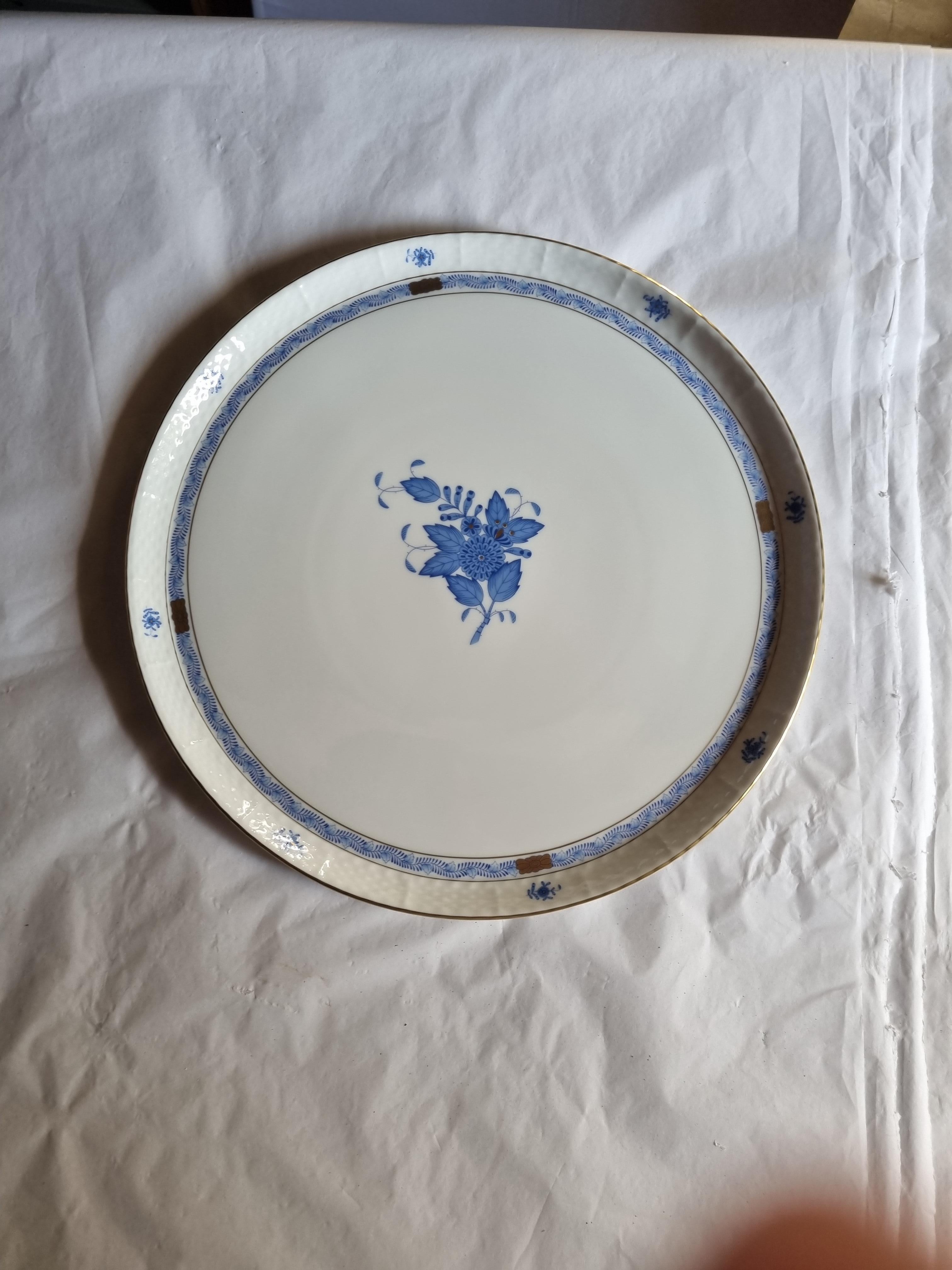 Herend Fine Porcelain Setting Piece set large round platter and 6 serving dish which could be used seperately or as a set.  Perfect for appetizers or dips!
Proposed in the blue variant of the famous Apponyi decoration.

The Herend Porcelain