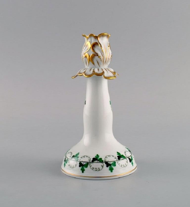 Herend candlestick in hand-painted porcelain with gold decoration. 
Mid-20th century.
Measures: 15 x 8.5 cm.
In excellent condition.
Stamped.