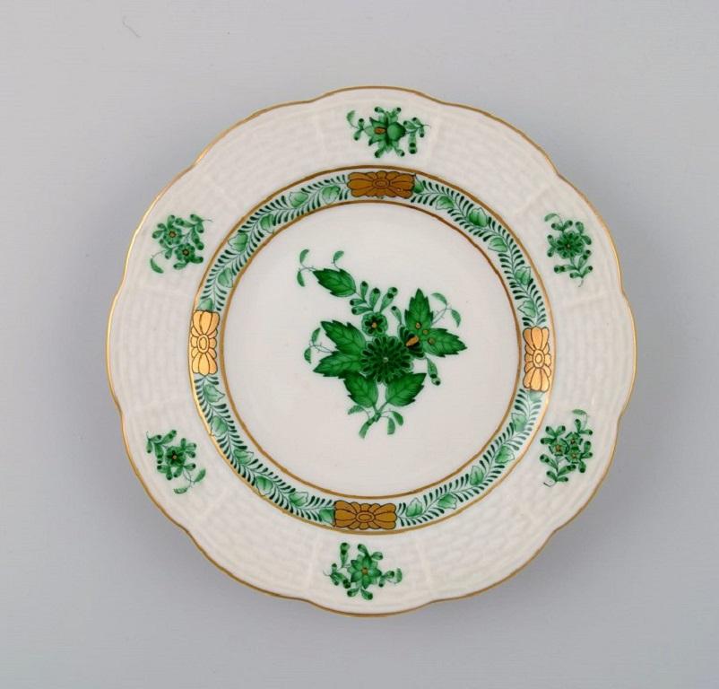 Herend green Chinese bouquet. 
Eight small bowls and four plates in hand-painted porcelain. Mid-20th century.
Plate diameter: 12.5 cm.
The bowls measure: 9.5 x 2 cm.
In excellent condition.
Stamped.