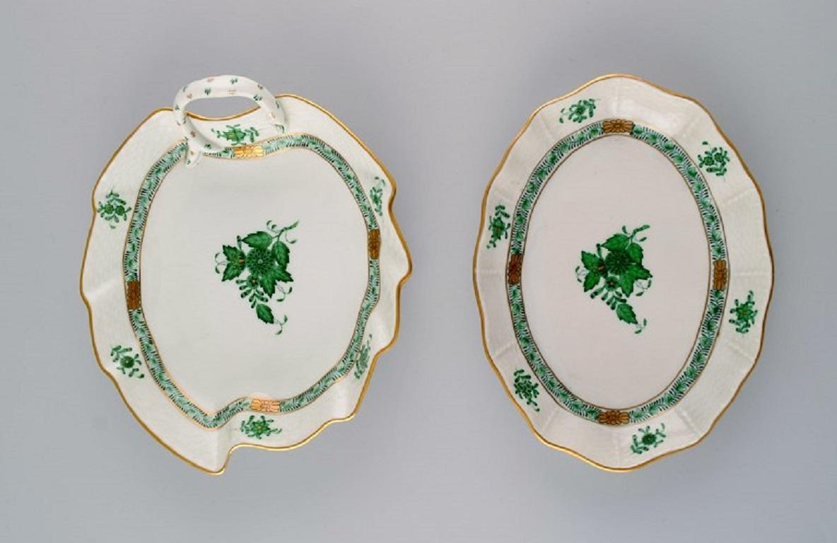 Herend Green Chinese bouquet. Four bowls in hand-painted porcelain. 
Mid-20th century.
Leaf-shaped dish measures: 20 x 7 cm.
Openwork bowl measures: 13 x 5 cm.
In excellent condition.
Stamped.