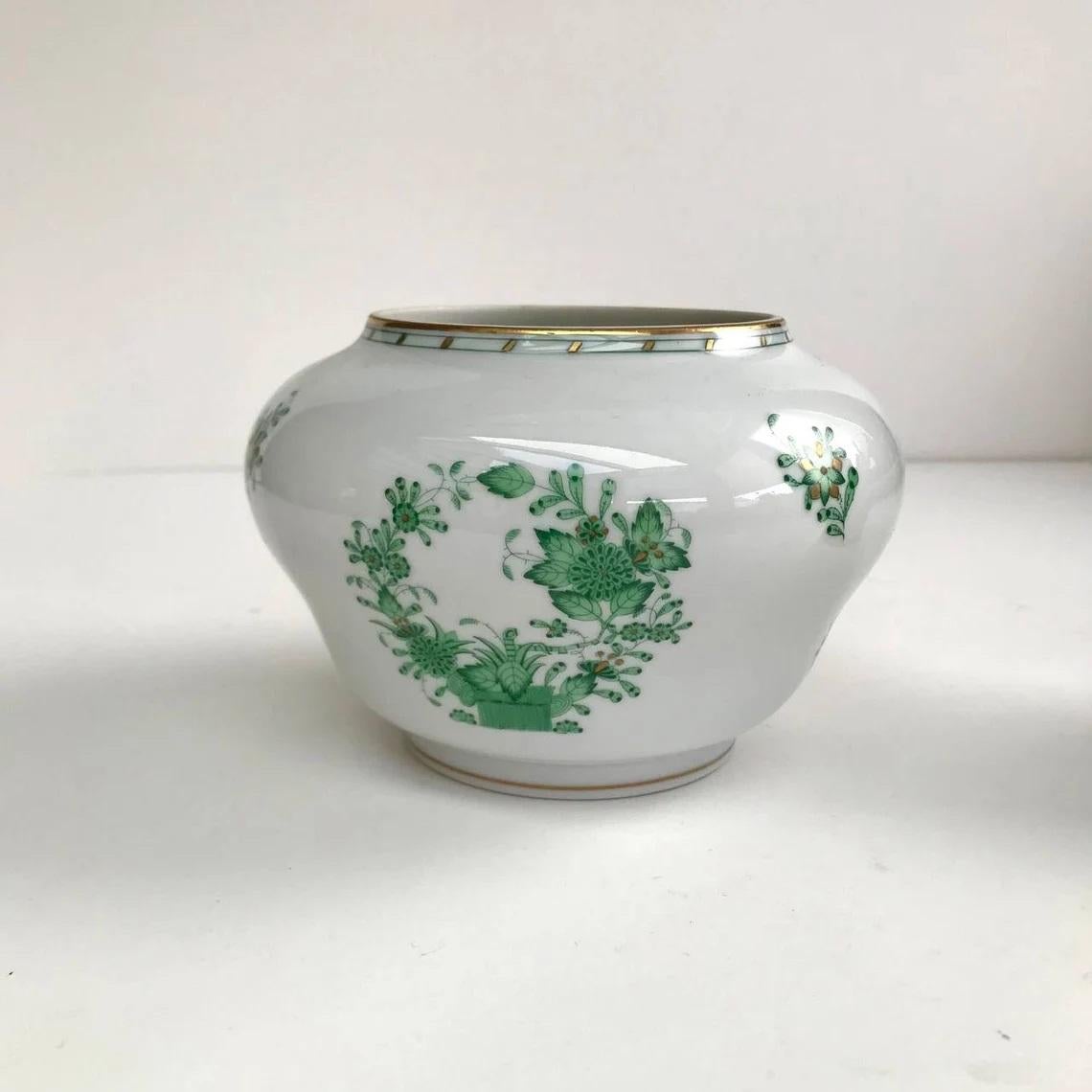 Herend green floral vase.

Herend - a supplier to the Royal Court of England.

Vase for Flowers.

Hungary.

Porcelain.

Vintage.

Hand-painted.

In excellent condition, no chips, cracks or crazing.

Size:

Height - 4.3 inc 11