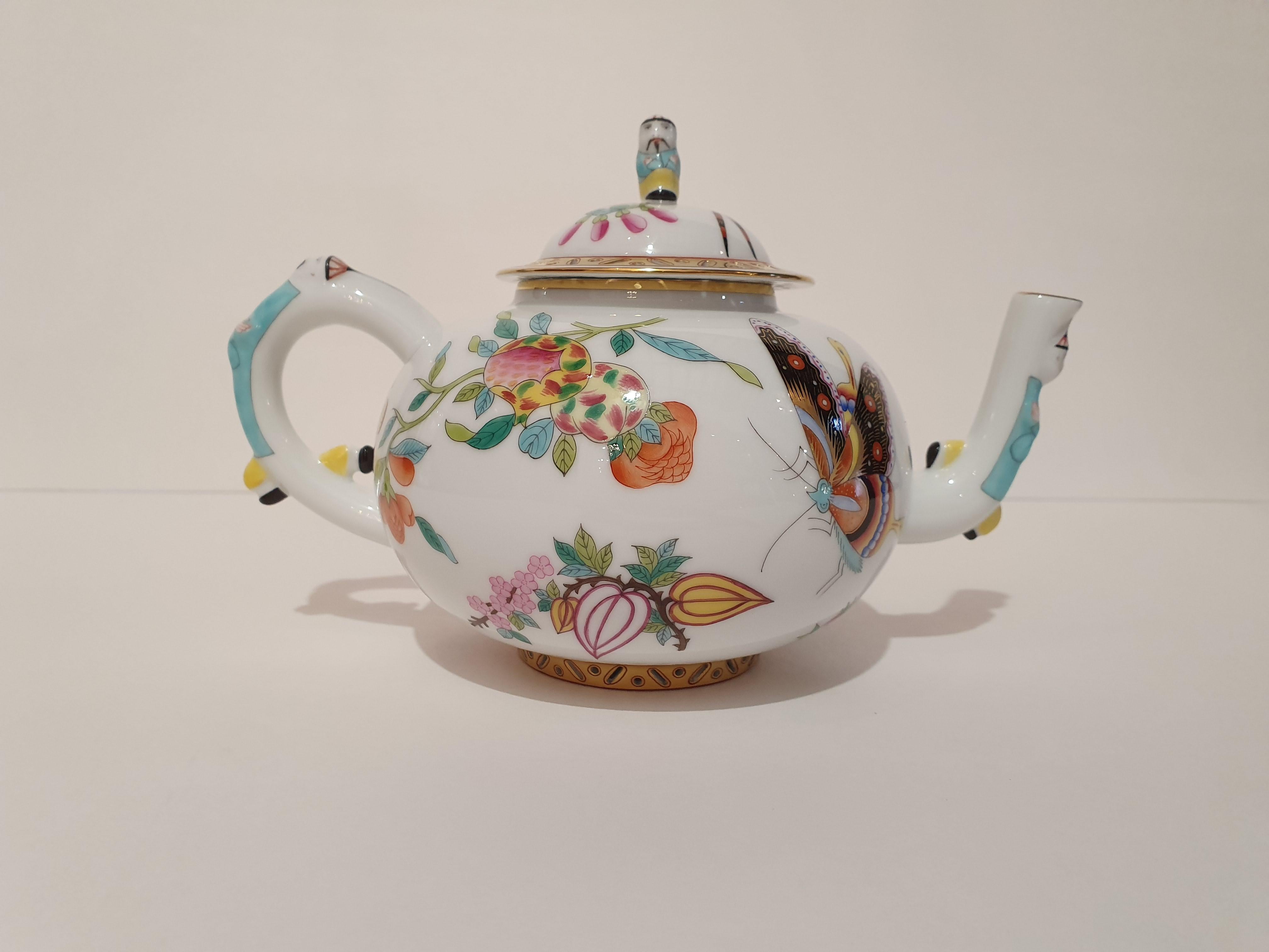 The first is hand painted by master decorator Erzsebet Rakoczy.
The splendid oriental painterly decor with flowers, birds and butterflies is perfectly combined with the Classic Esterházy shape, note the lace-like fretworks on porcelain at the base