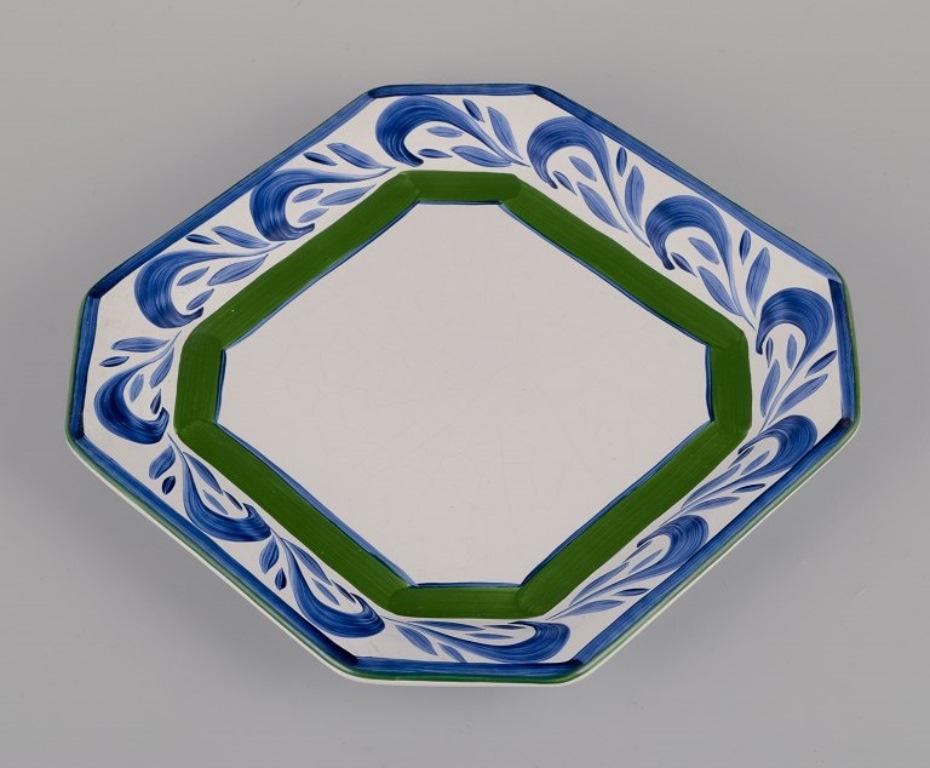 Herend, Hungría. Cuatro platos cuadrados de cerámica. Aprox. 1980 Pintado a mano en venta