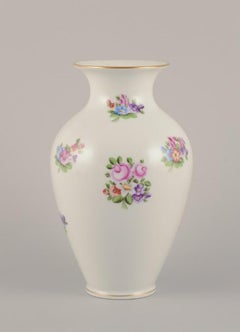 Herend, Hungary. Large porcelain vase hand-painted with flower motifs