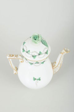Herend, Hungary. Porcelain coffee pot with lid and green leaf decoration.
