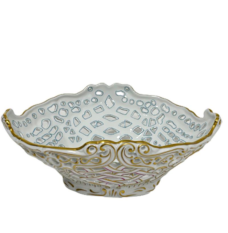 Herend Hungary porcelain openwork basket with Rothschild pattern.

Herend Hungary porcelain openwork basket with Rothschild pattern with birds and butterflies. The inside of the basket with light blue edges and the outside with rocaille curls with