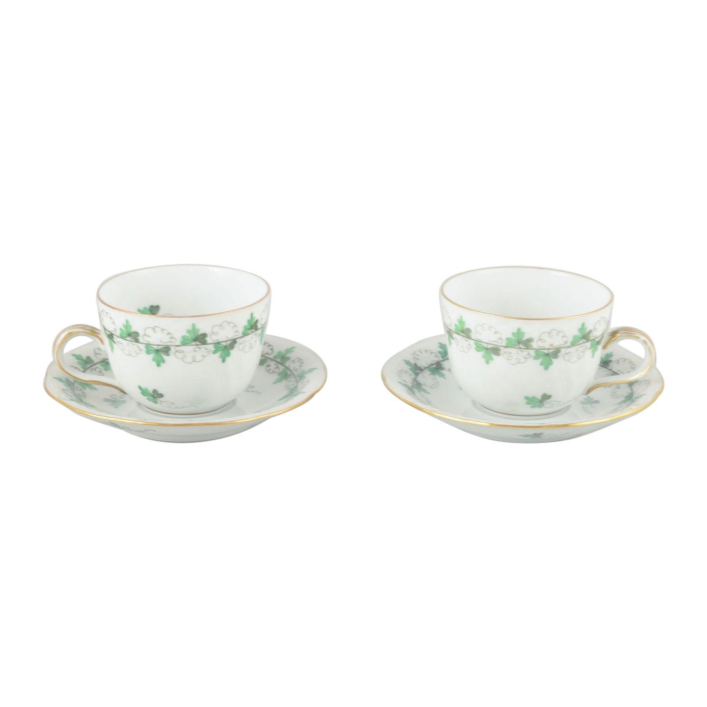 Herend, Hungary. Porcelain set of 2 demitasse cups with saucers, mid-20th C.