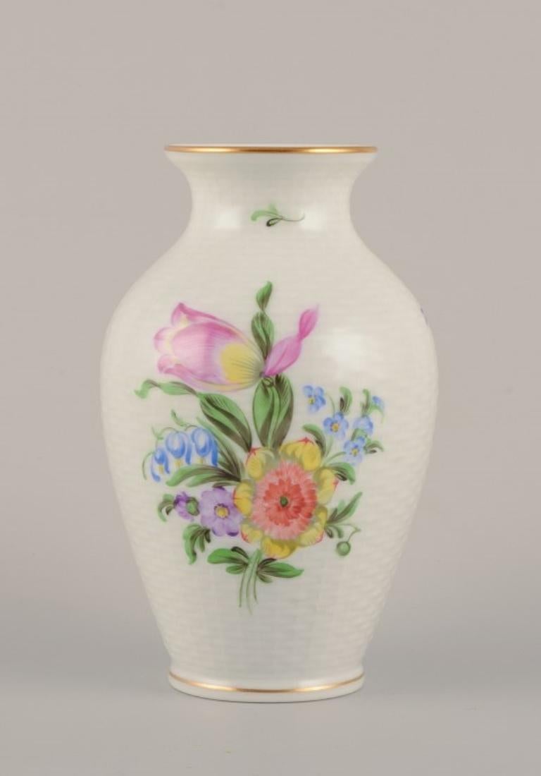 Hungarian Herend, Hungary. Porcelain vase hand-painted with polychrome flower motifs For Sale