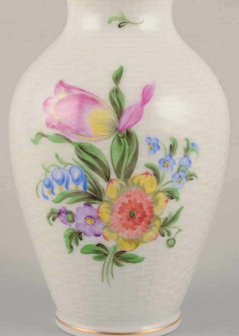 Hand-Painted Herend, Hungary. Porcelain vase hand-painted with polychrome flower motifs For Sale