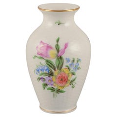 Vintage Herend, Hungary. Porcelain vase hand-painted with polychrome flower motifs