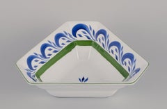 Herend, Hungary. Two large salad bowls and a salt and pepper set in ceramic.