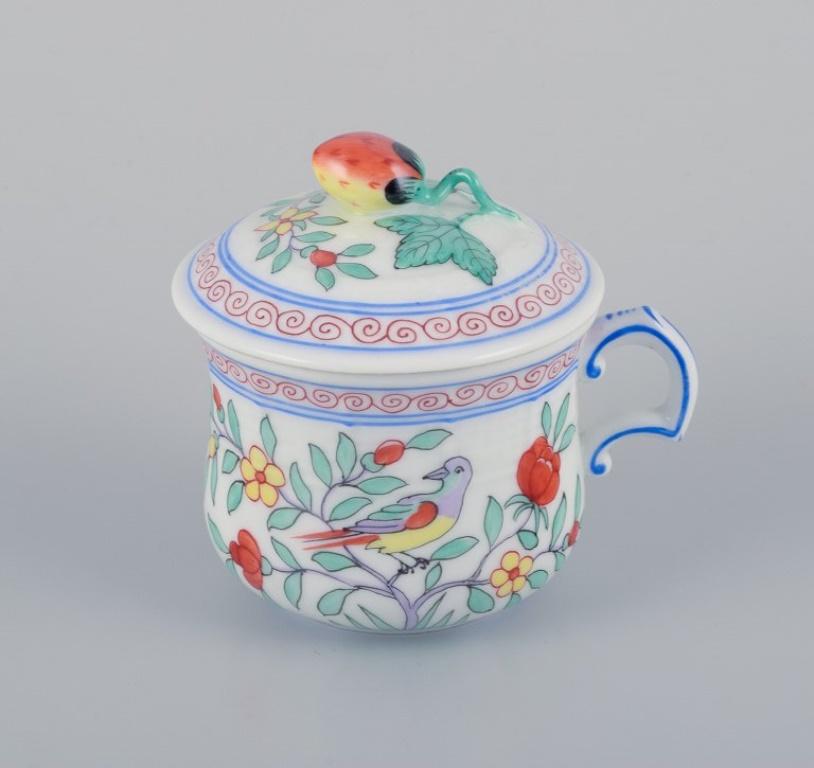 Hungarian Herend, Hungary, two porcelain bouillon cups, with flowers and birds