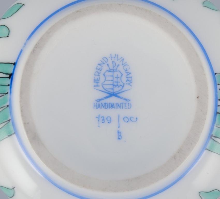 Herend, Hungary, two porcelain bouillon cups, with flowers and birds 1