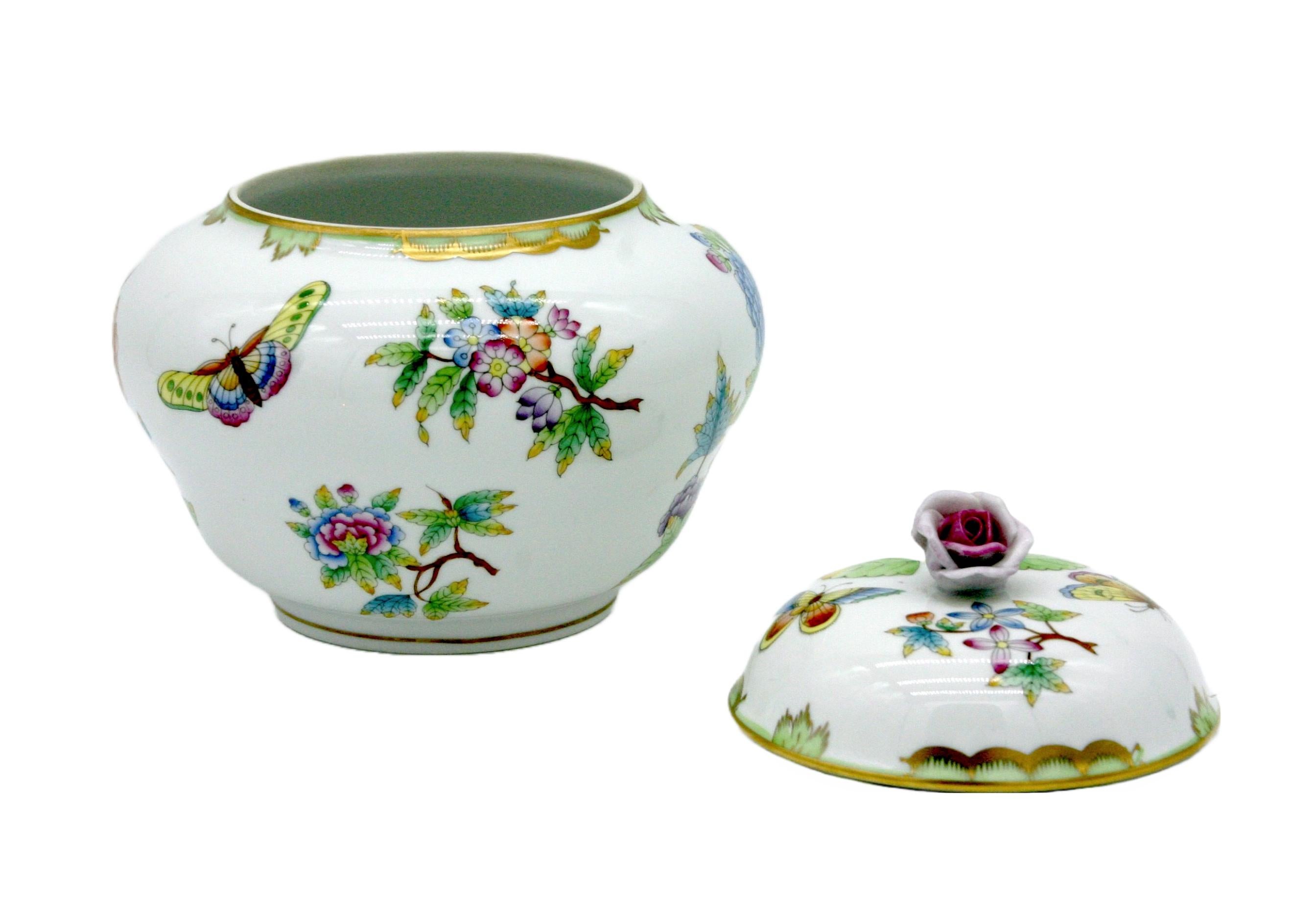 Classic Herend Queen Victoria pattern is tranformed from special dinnerware into a beautifully decorated urn/vase. Stunning art in its own right and beautifully hand-painted with gold accents and floral details. The piece is in excellent condition.