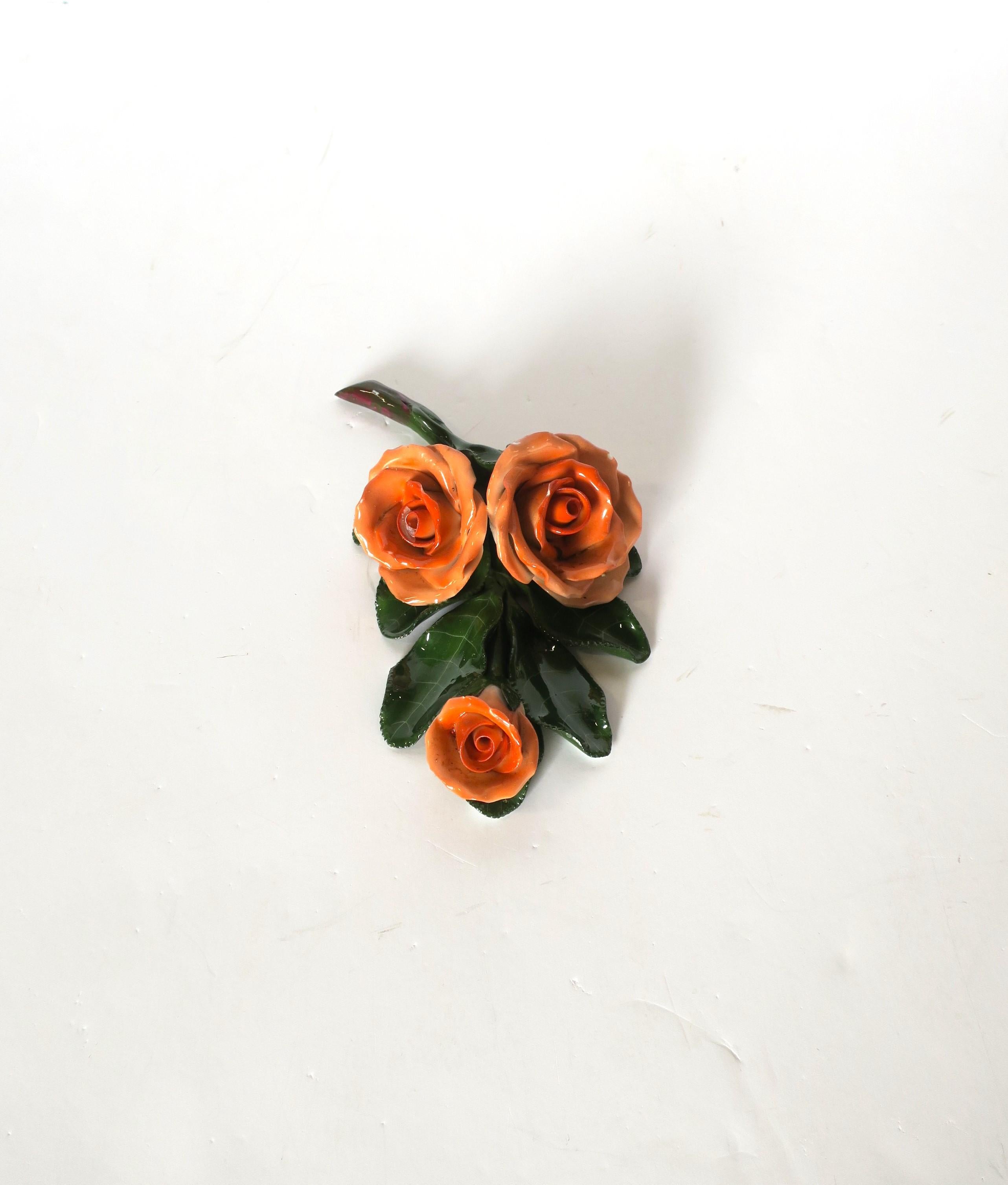 A beautiful Herend porcelain salmon orange roses with green leaves and vine/stem decorative object, 2001, Hungary. Marker's mark on underside as shown in last image. Dimensions: 6