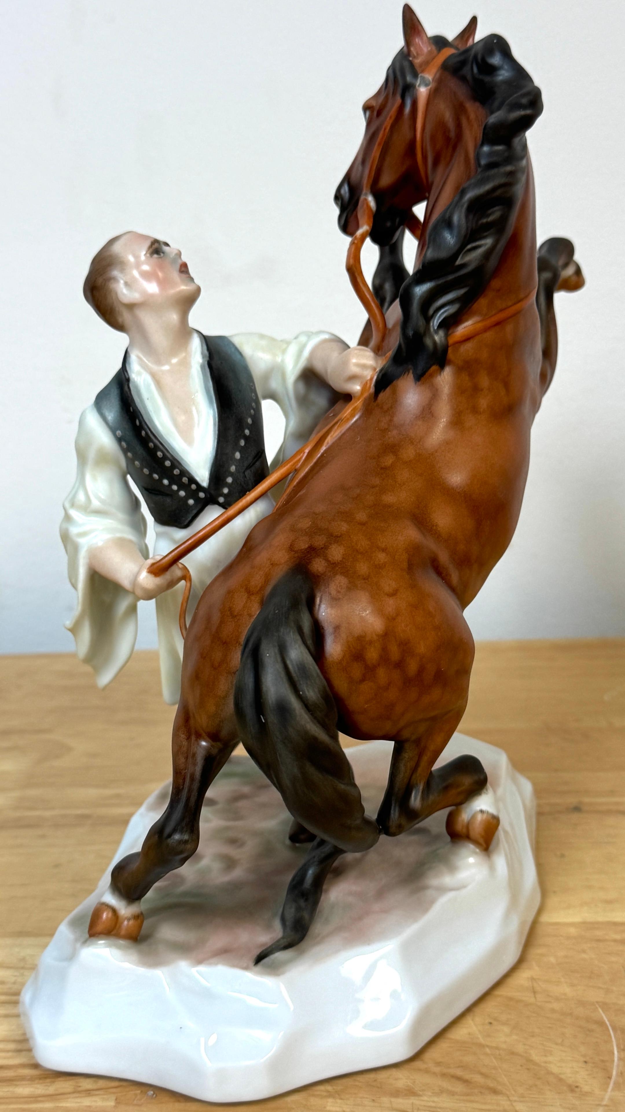 Herend Porcelain Figurine of a Rearing Horse and Handler, Signed Horváth Attila, Hungary

A dynamic and finely hand-painted Herend porcelain figurine depicting a powerful rearing horse restrained by a traditional Hungarian handler. Standing an