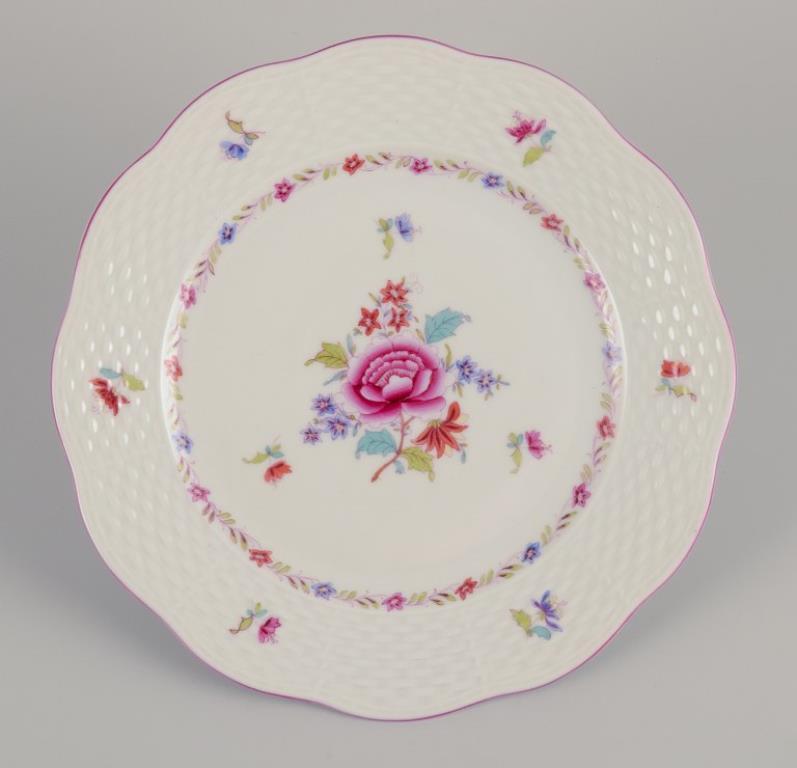 Herend, a set of twelve porcelain plates.
Hand-painted with polychrome floral motifs.
Pink rim.
Marked and dated 1944.
Perfect condition. Like new.
Dimensions: Diameter 18.5 cm.