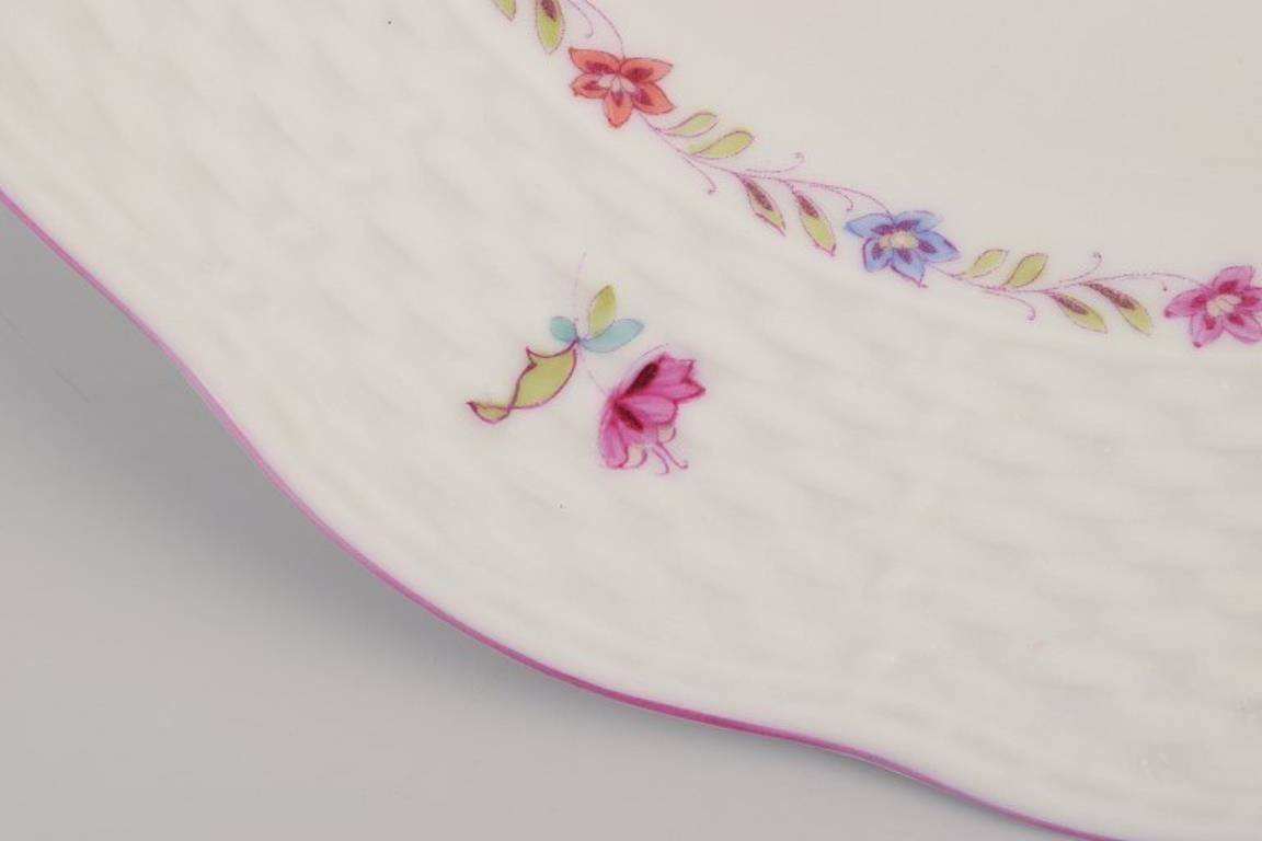 Herend, set of twelve porcelain plates with polychrome floral motifs. In Excellent Condition For Sale In Copenhagen, DK