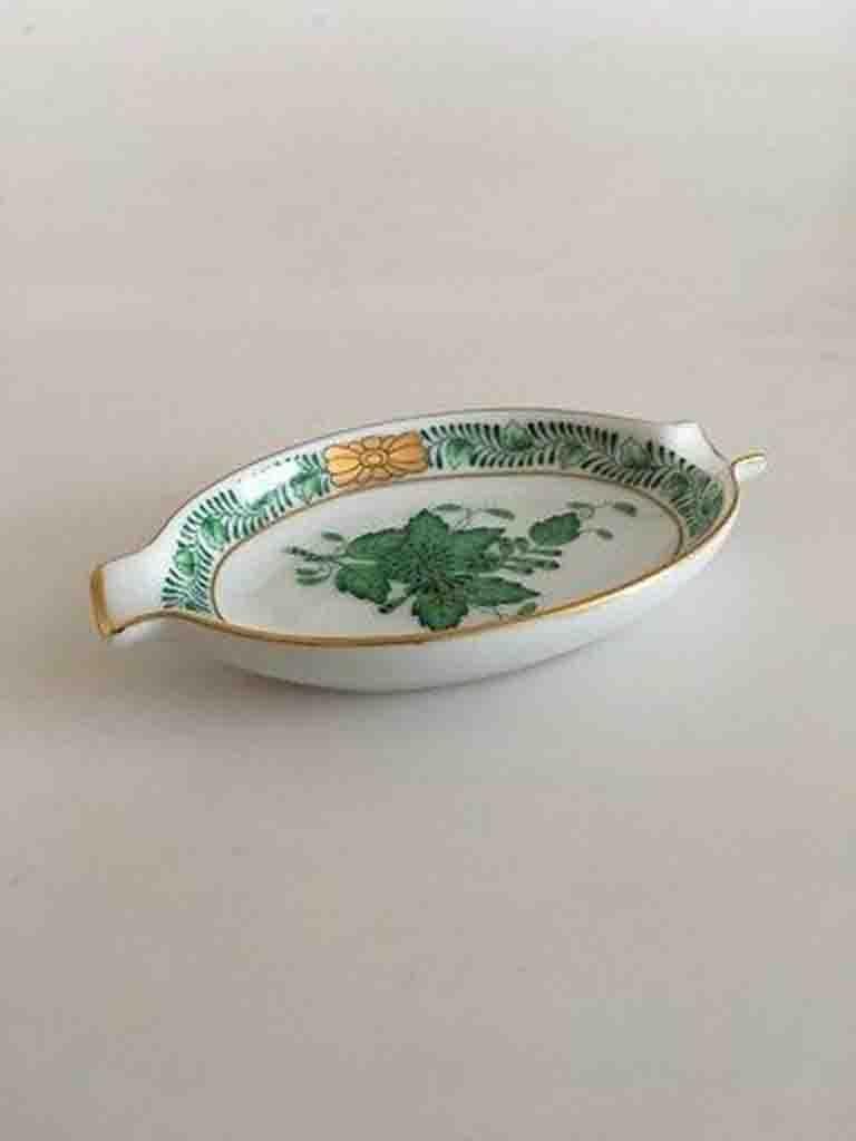 Herend Ungarsk Chinese Bouquet green spoon holder dish.

Measures 9cm and is in good condition.