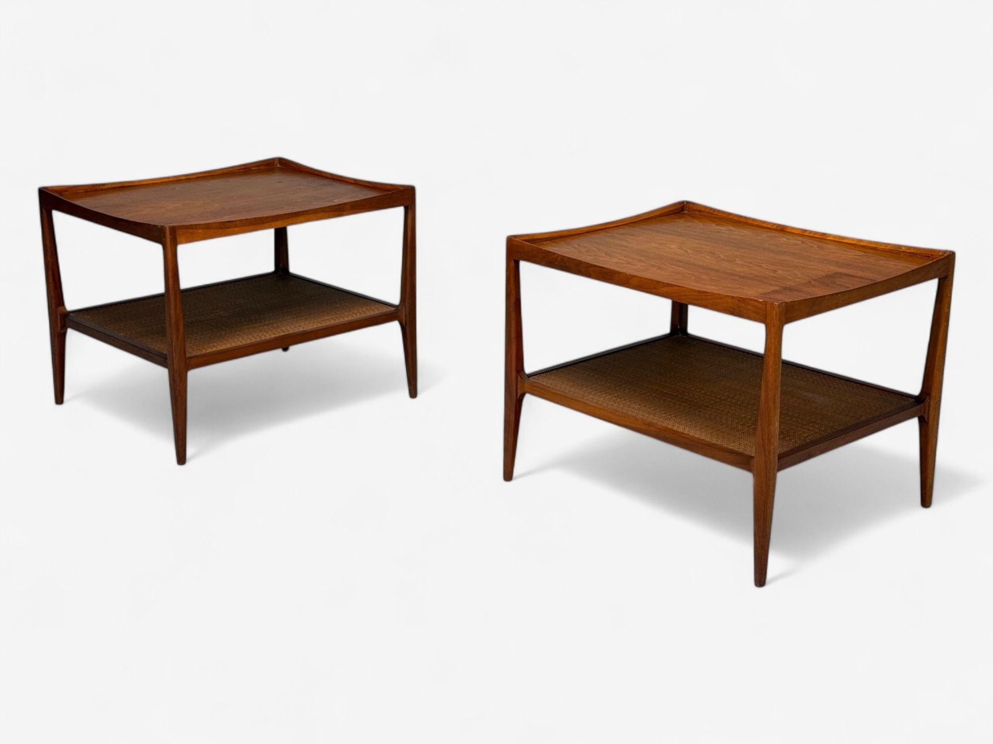 Heritage, American Mid-Century Modern, Walnut, Cane, End Tables, USA, 1960s

Pair of walnut and cane end tables designed and produced by Heritage in the United States c. 1960s. Each example features a walnut frame, top tier surface, and a tightly