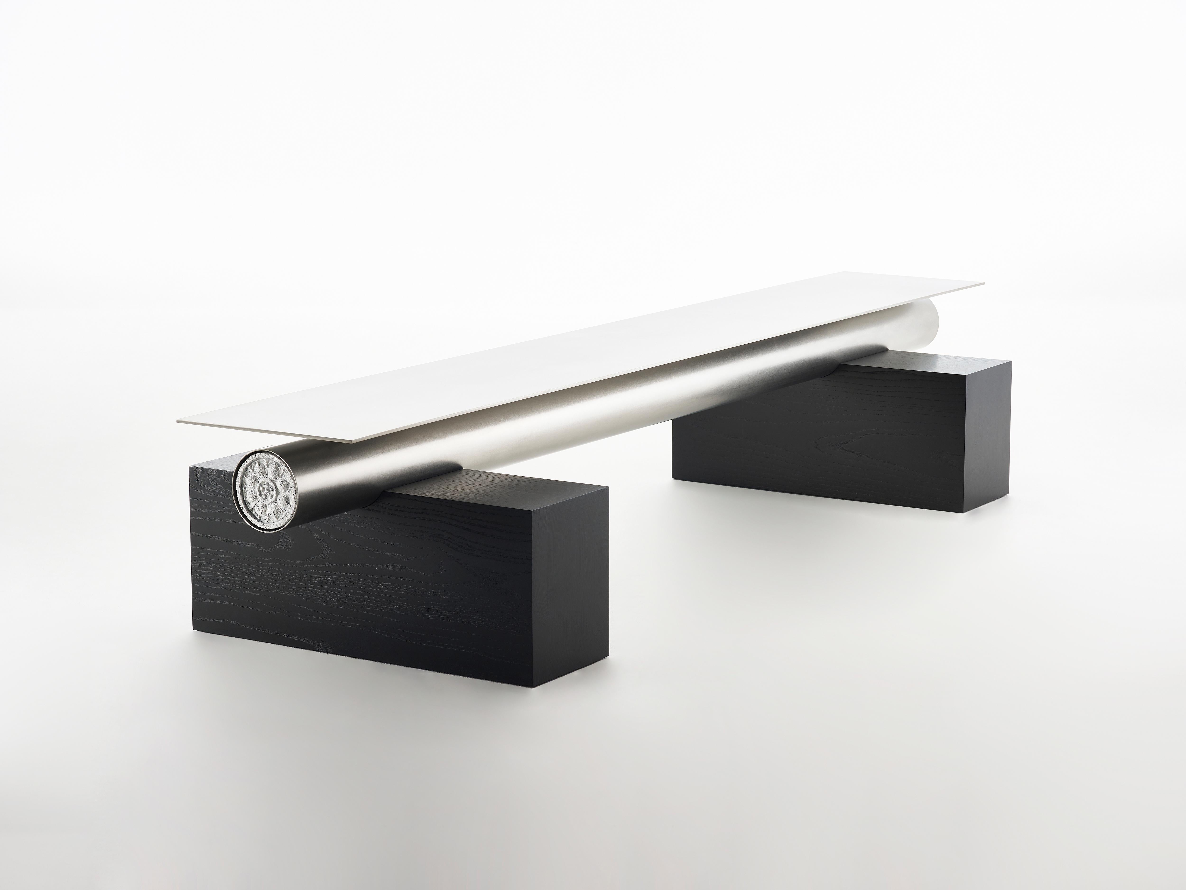 Heritage Bench by Lee Jung Hoon
Dimensions: D 60 x W 200 x H 36.5 cm
Materials: Granite, Ash, Stainless Steel.

The Heritage series, created by designer Lee Jung-hoon is a collection of sculptural modern furniture. The designs are inspired by the