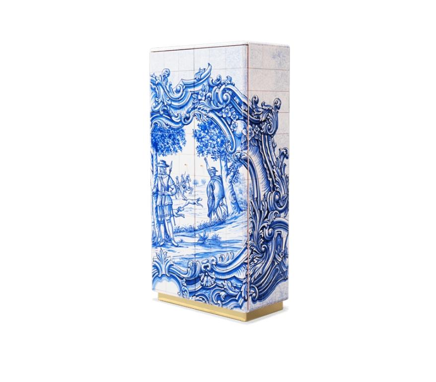 The Heritage Cabinet is a magnificent journey through the Portuguese legacy. Covered in Azulejos, traditional hand-painted tiles, and one of the most representative art forms of Portuguese culture, the architectural cabinet portrays different scenes