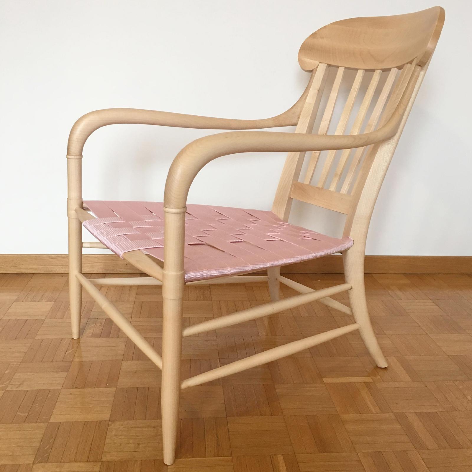 Designed by Federico Carandini, 2014, this exclusive chair revisits the silhouette of the Chiavari dormeuse from the 19th century in a contemporary style. Handcrafted of solid maple wood with a natural finish, this piece boasts graceful and flowing