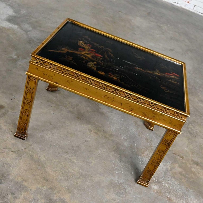 Stunning vintage chinoiserie hand painted and carved gilt wood end table with glass insert by Heritage Furniture. Beautiful condition, keeping in mind that this is vintage and not new so will have signs of use and wear. Note there is some peeling