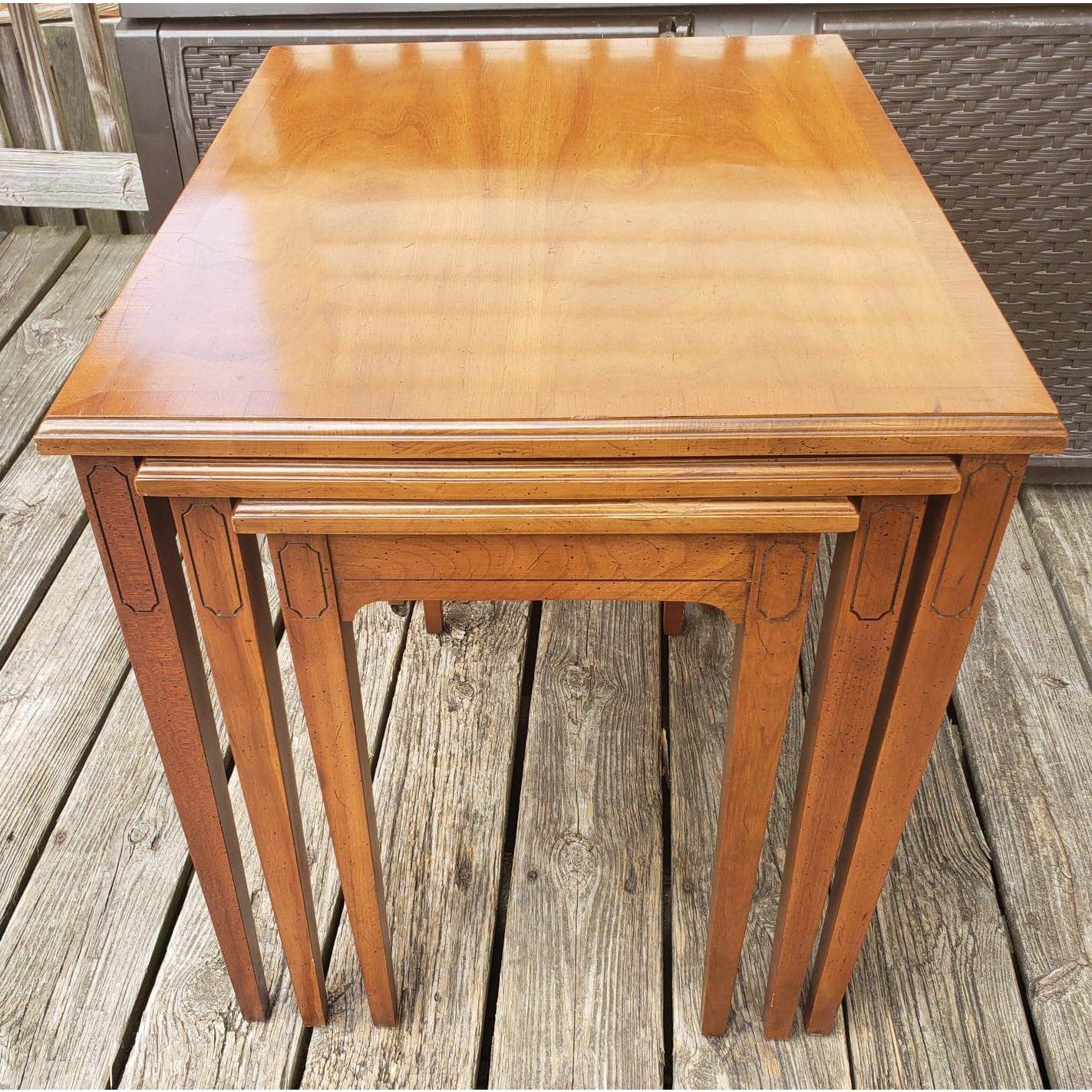 Great set Vintage Heritage Furniture Fryitwood nesting tables in great vintage condition. Built in rails for easy slide nesting. Larger Table measure 20W x 25D x 23H.
 