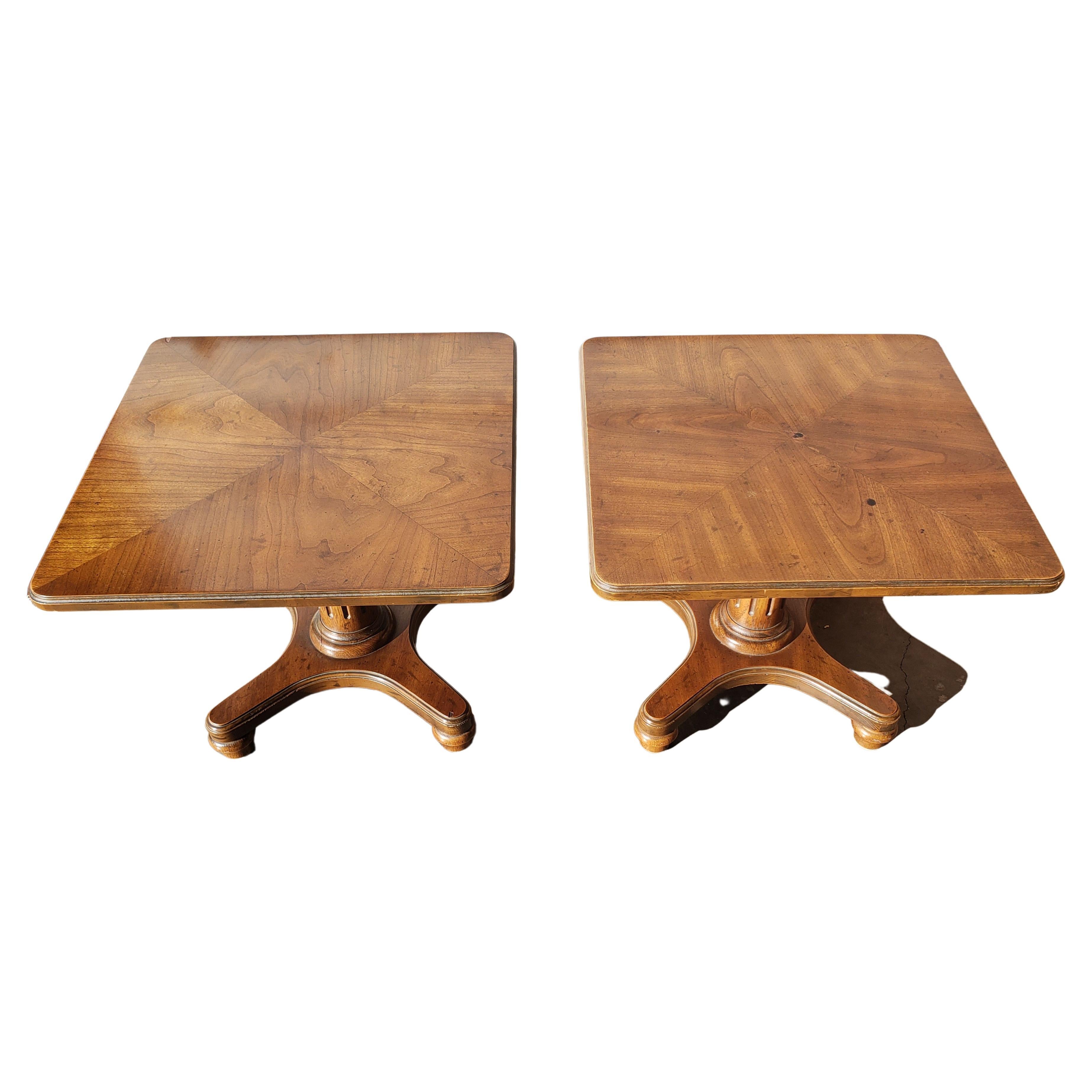 Heritage Furniture walnut book matched top pedestal side tables.
Good vintage condition with wear consistent with age and use. 
Measures: 20 inches square and stand 16.5