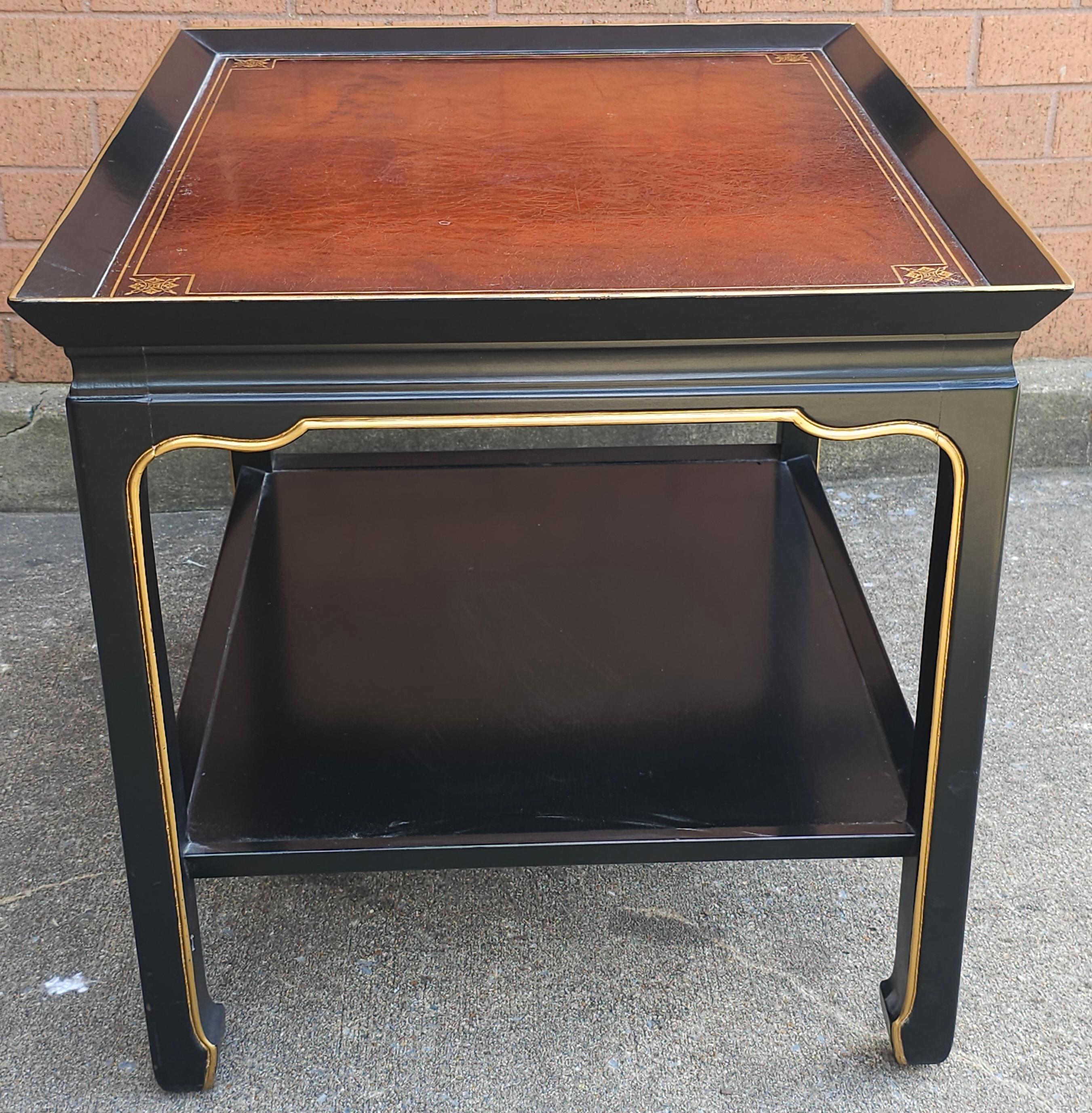 Table d'appoint à deux niveaux Heritage Henredon Ebonized and Parcel Gilt en vente 1