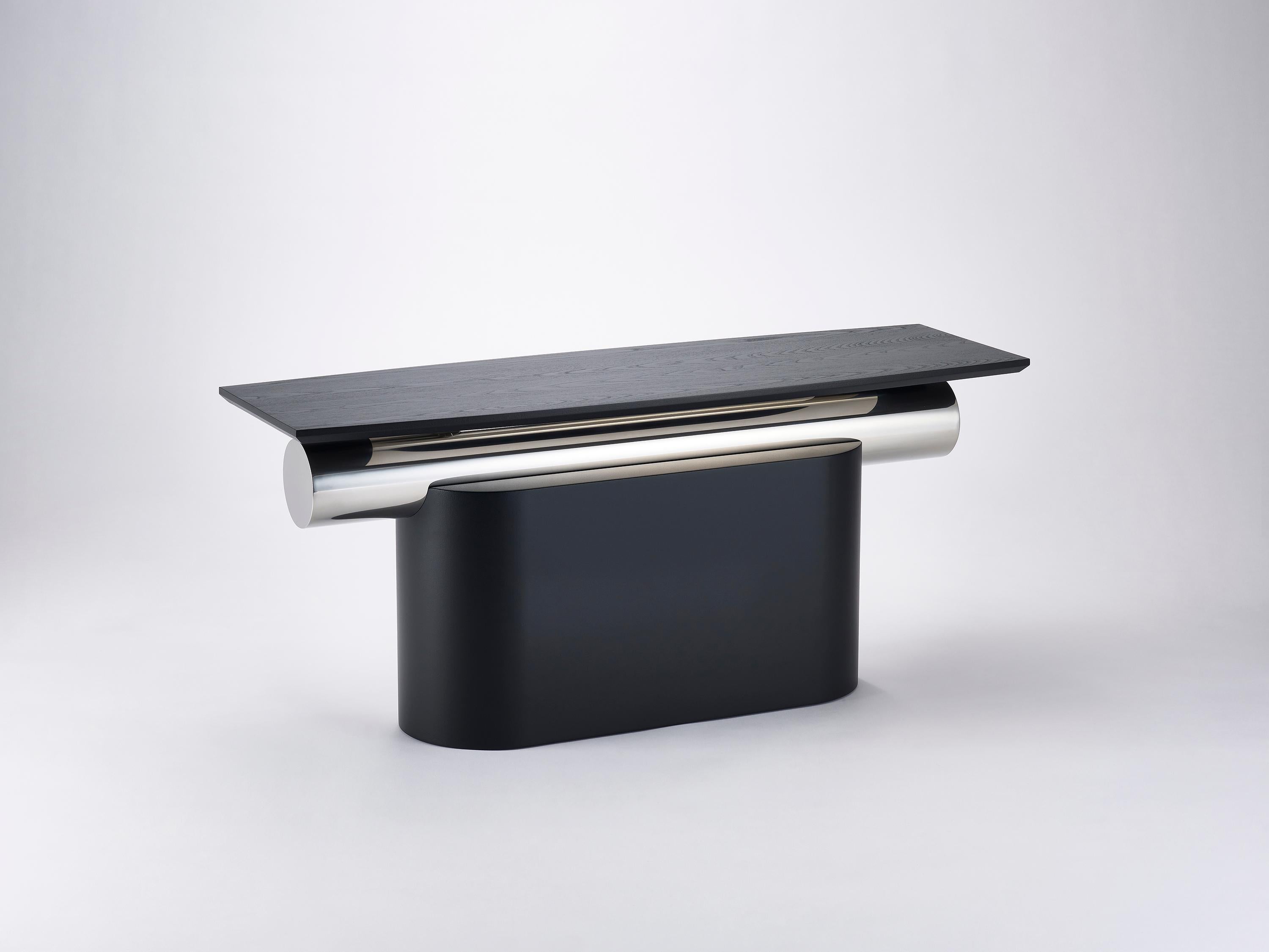 Table courbée Heritage Layer de Lee Jung Hoon
Dimensions : D 34 x L 104,5 x H 45,1 cm
MATERIAL : Acier, frêne, acier inoxydable.

La série Heritage, créée par le designer Lee Jung-hoon, est une collection de meubles modernes sculpturaux. Les designs