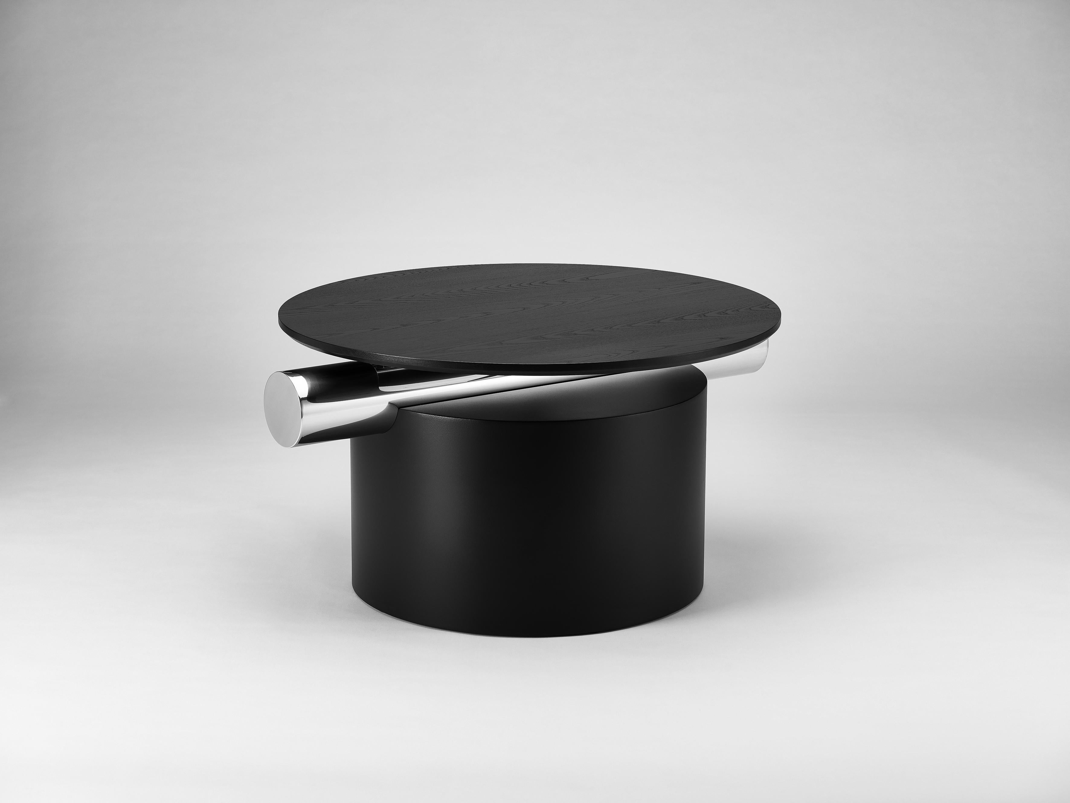 Heritage Layer Round Table by Lee Jung Hoon
Dimensions: D 78 x W 88 x H 44.1 cm
Materials: Steel, Ash, Stainless Steel.

The Heritage series, created by designer Lee Jung-hoon is a collection of sculptural modern furniture. The designs are inspired