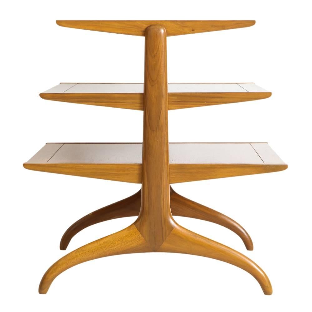 Heritage Magazine Table 3 Tier Walnut Signed, USA, 1950s. Large three-tier table with half circle base and incised shelves. Branded on underside of table: Heritage 307-E 6-58. Professionally refinished. 