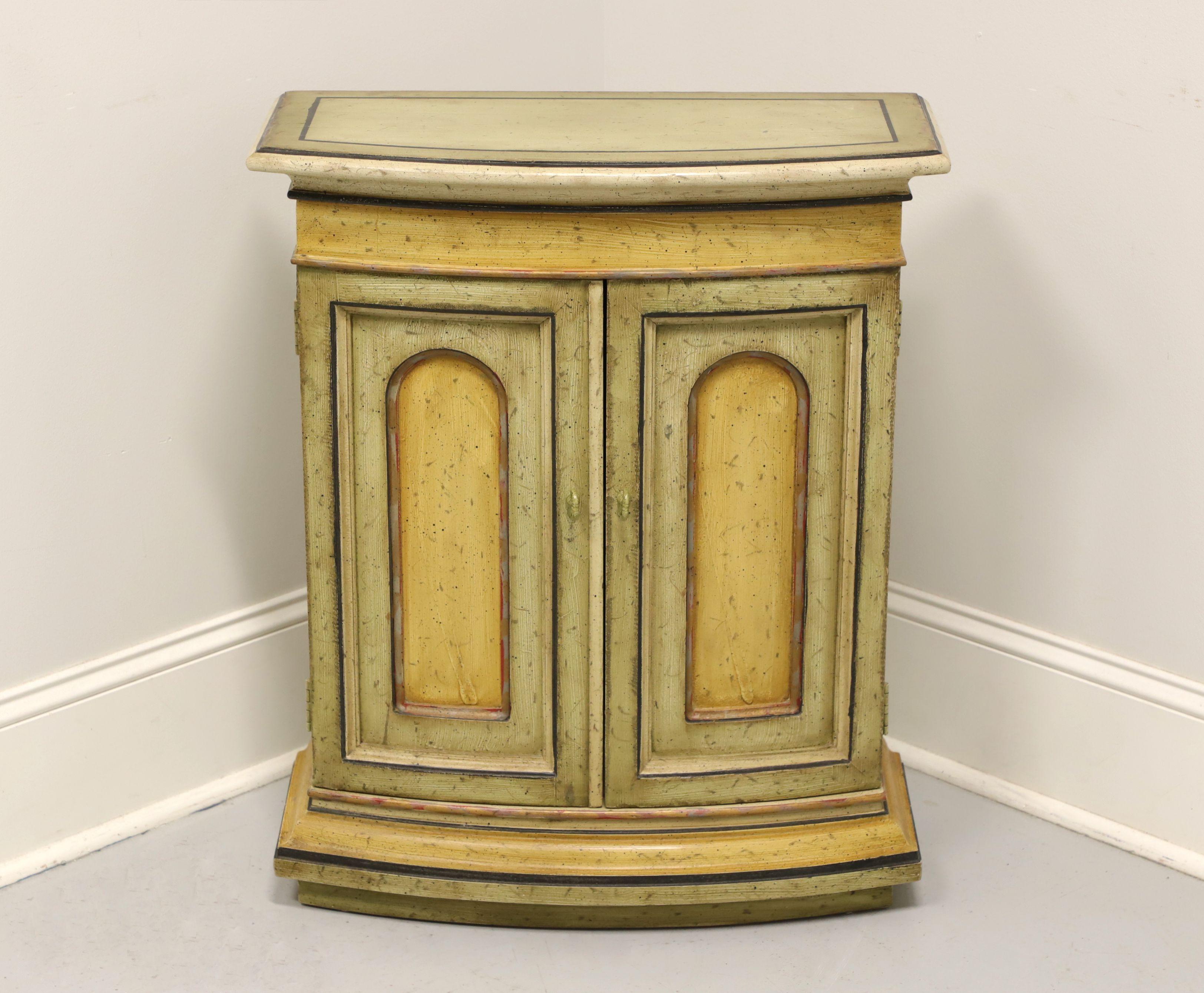 A French Country style console cabinet by Heritage. Hardwood painted and distressed with painted brass hardware. Features two doors revealing storage with one adjustable wooden shelf. Made in North Carolina, USA, in the mid 20th