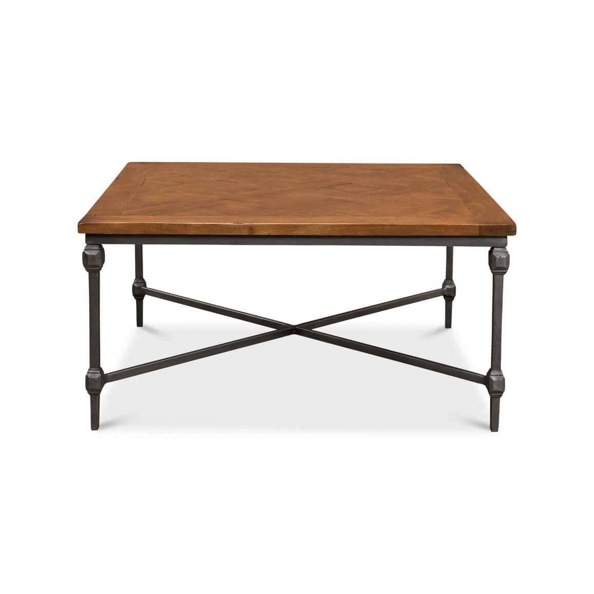 A fusion of robust metal and warm wood that brings industrial character and European countryside charm to your living area.

The table top, with its parquet inlays, rustic inviting wood grain and rich finish, sits atop a sturdy iron X stretcher