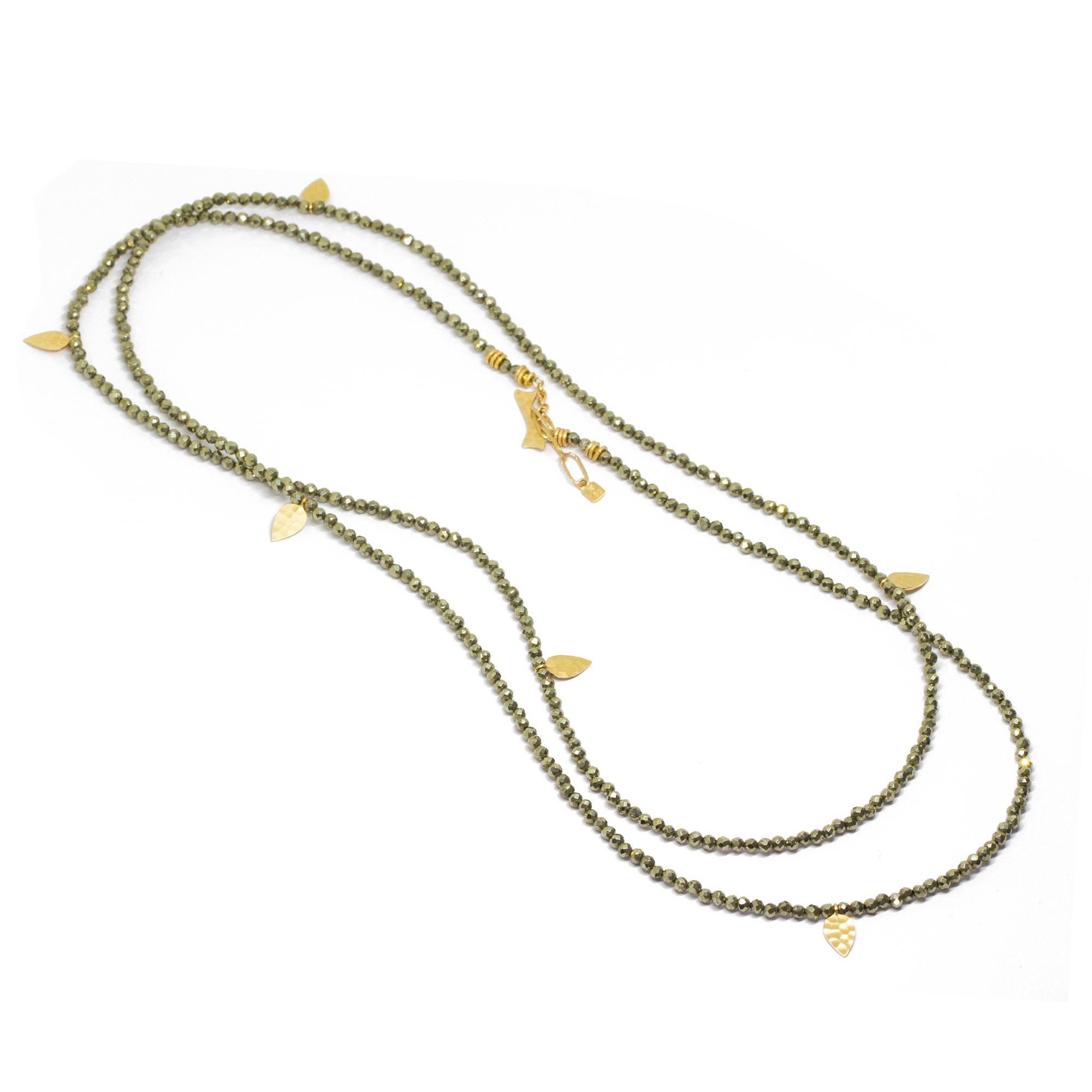 The best part about our Heritage Pyrite Necklette isn’t just that it can be worn long, doubled-up, or as a wrap bracelet (although that’s pretty cool). It’s that you can thread any of our Charms onto the pyrite beads—have fun playing with all the