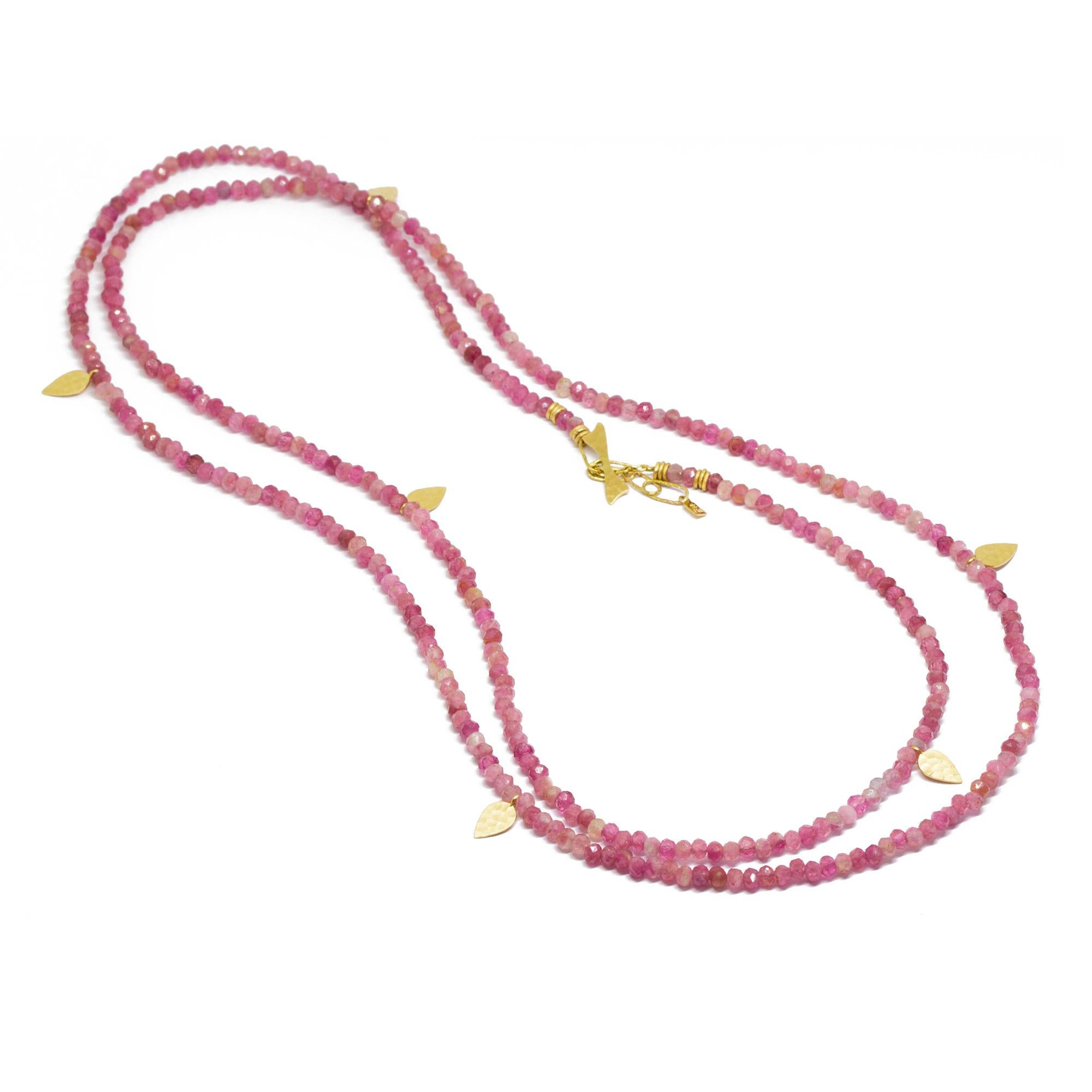The best part about our Heritage Red Tourmaline Necklette isn’t just that it can be worn long, doubled-up, or as a wrap bracelet (although that’s pretty cool). It’s that you can thread any of our Charms onto the red tourmaline beads—have fun playing