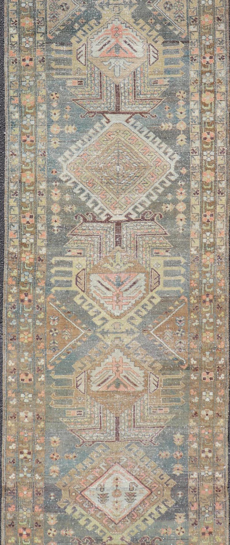 Heriz Antique Persian Rug with Geometric Medallions in Steal Blue, Brown & Peach In Good Condition For Sale In Atlanta, GA