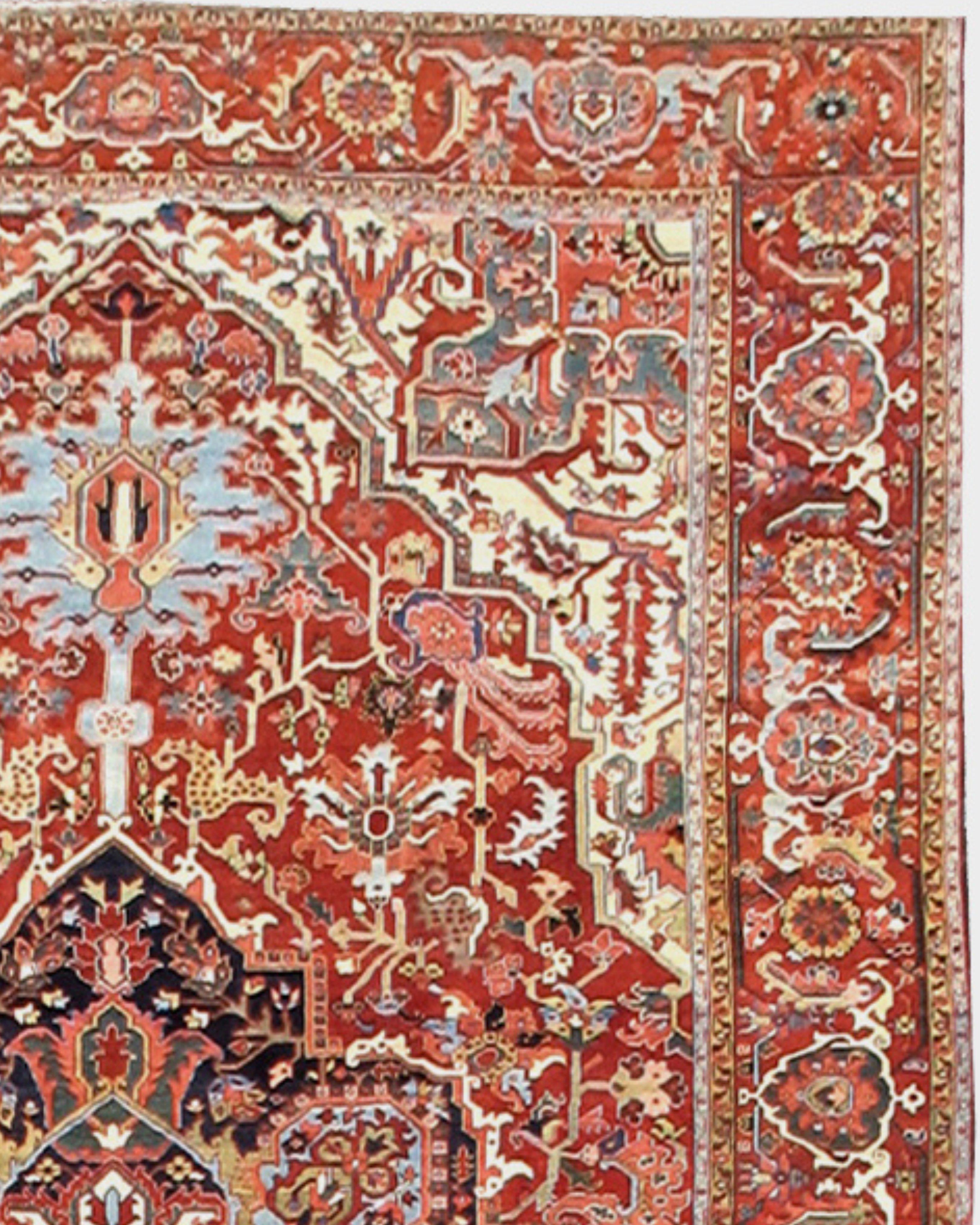 Antique Large Persian Heriz Carpet, Early 20th Century

Heriz rugs and carpets were woven in Northwest Persia starting in the Mid-19th Century in response to a great increase in demand for rugs internationally. Prior to that, there were no rugs
