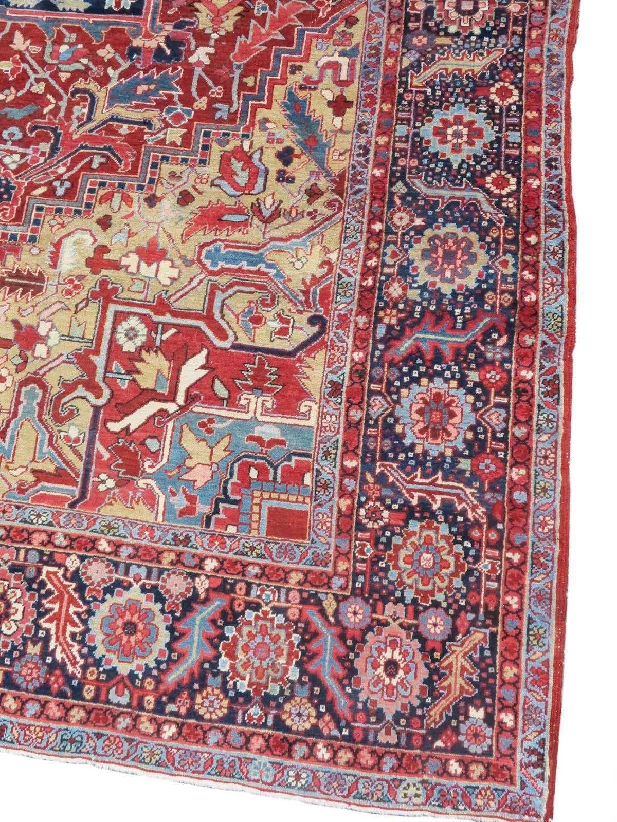 Persian Heriz carpet from the early 20th century. Measures 11'10